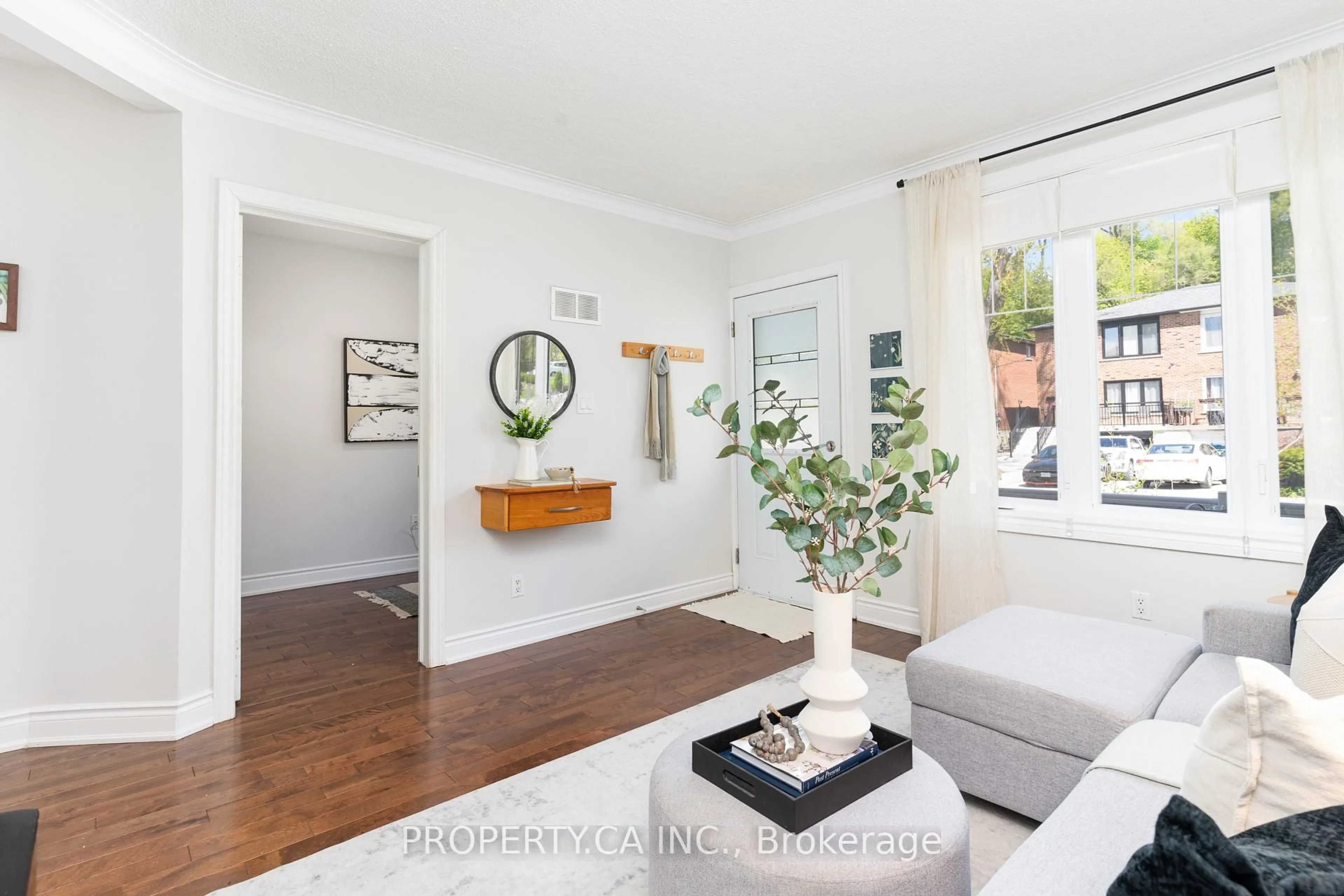 Living room with furniture, wood/laminate floor for 69 Jasper Ave, Toronto Ontario M6N 2N2