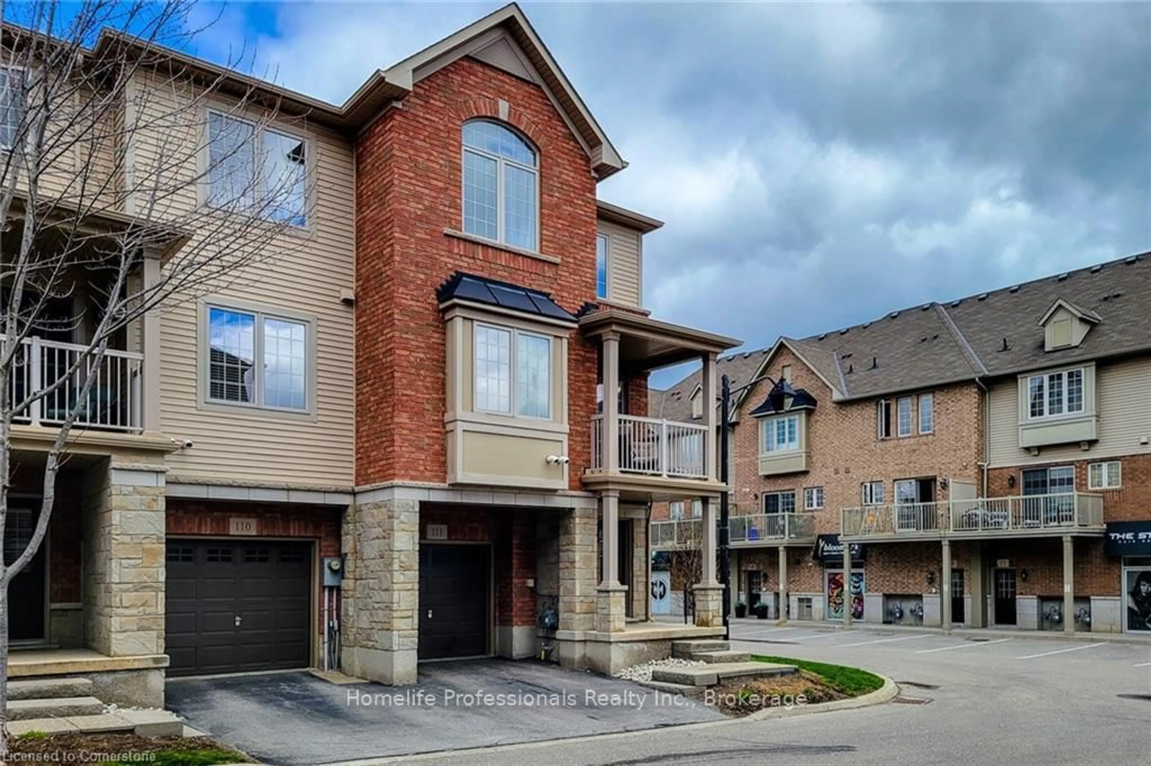 Home with brick exterior material, street for 1401 Plains Rd #111, Burlington Ontario L7R 0C2