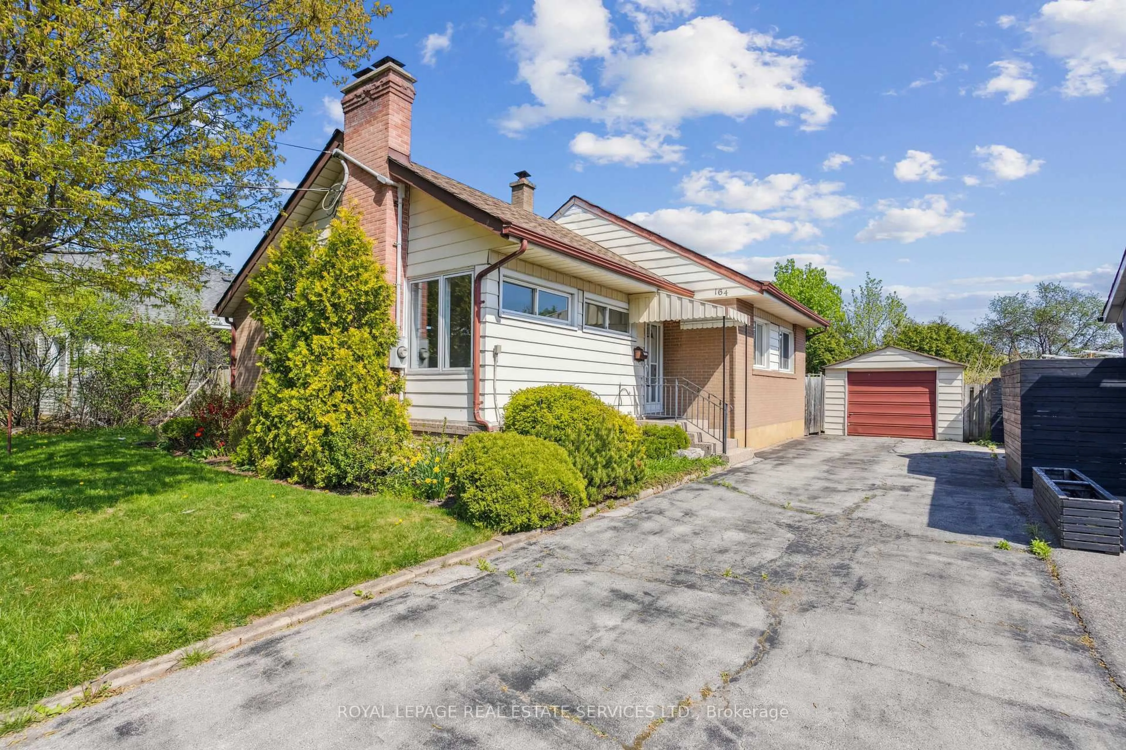 Home with brick exterior material, street for 164 Mansfield Dr, Oakville Ontario L6H 1K4