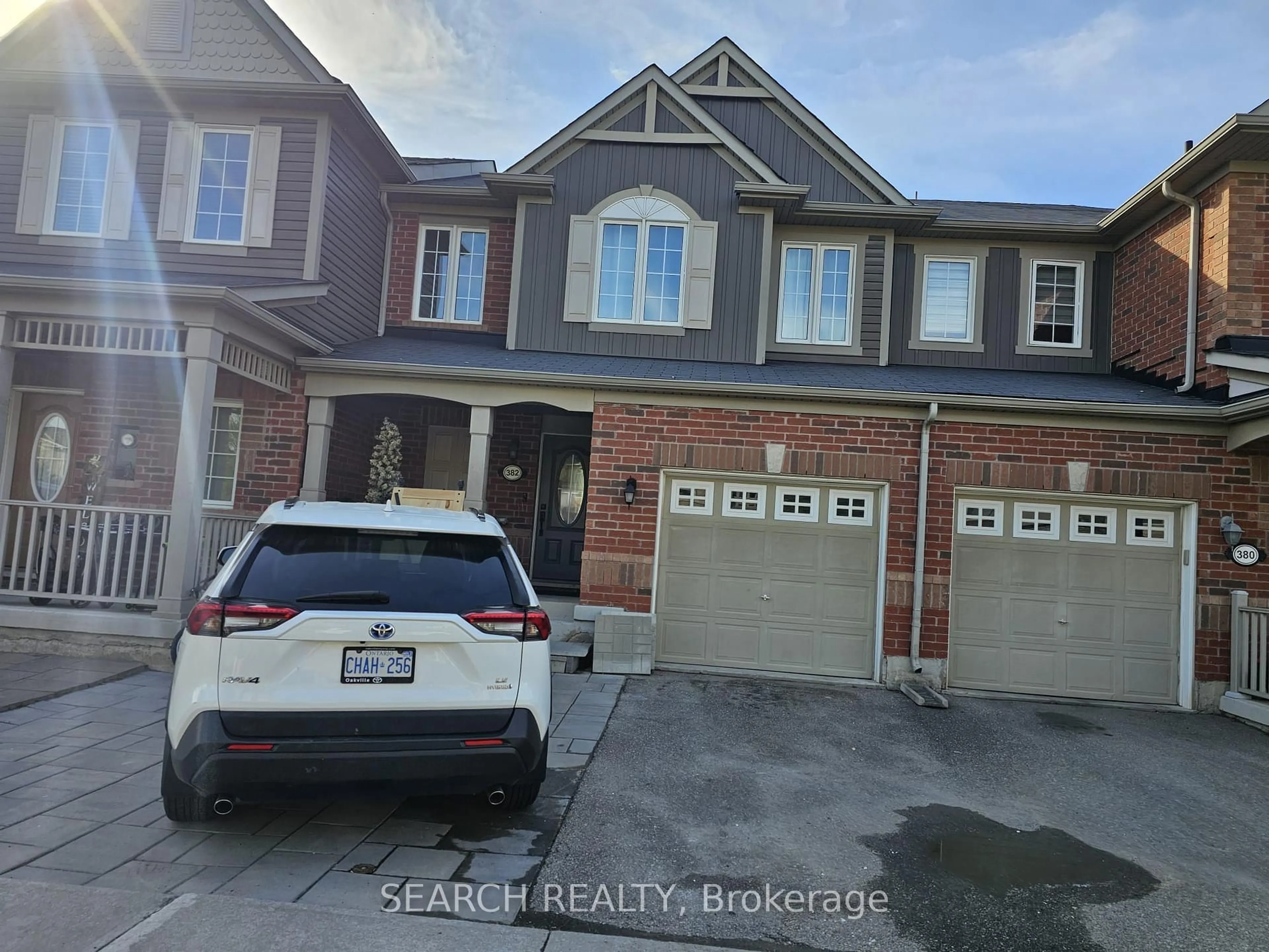 Home with brick exterior material, street for 382 Cavanagh Lane, Milton Ontario L9T 8J9