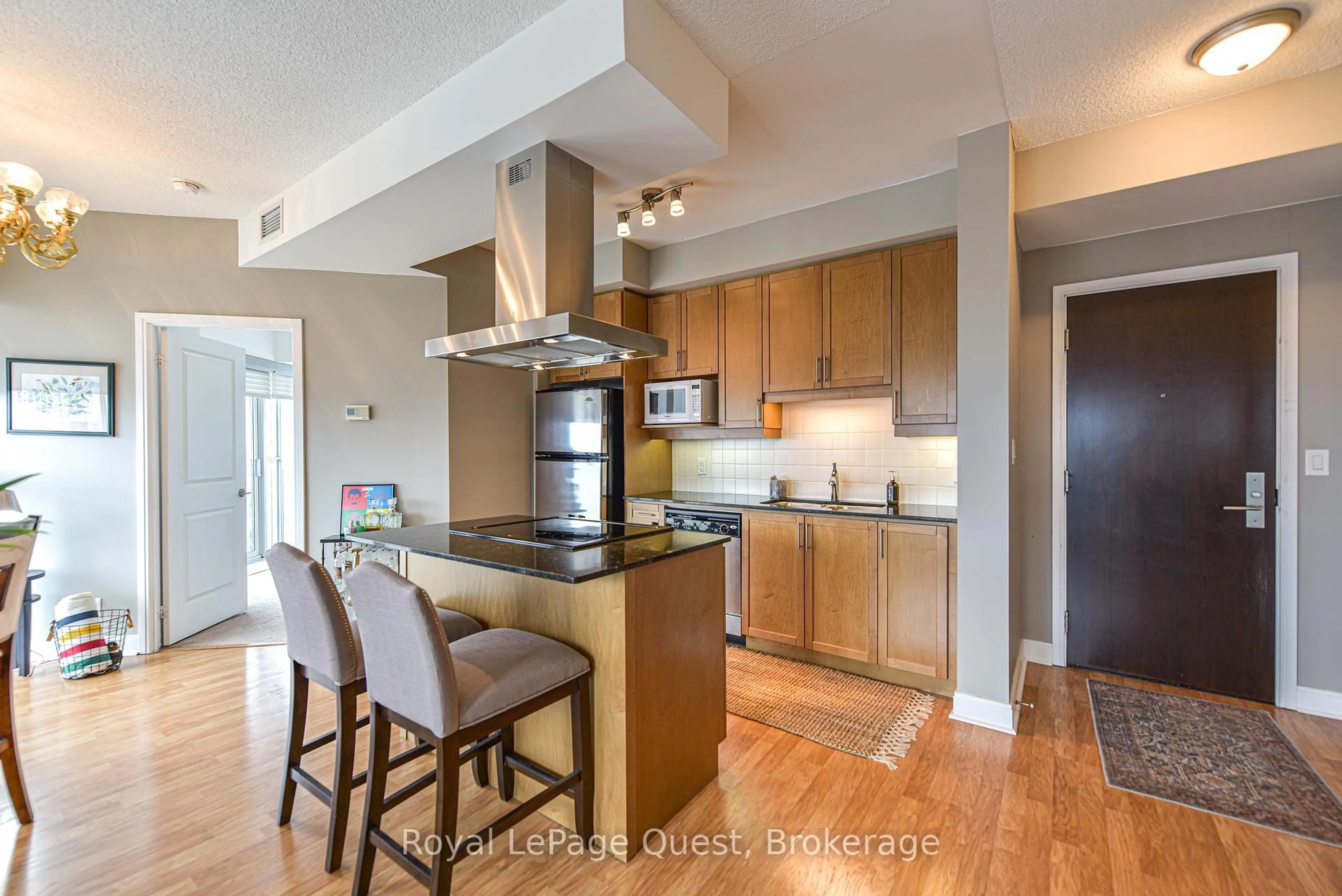 Open concept kitchen, wood/laminate floor for 50 Absolute Ave #3606, Mississauga Ontario L4Z 0A8