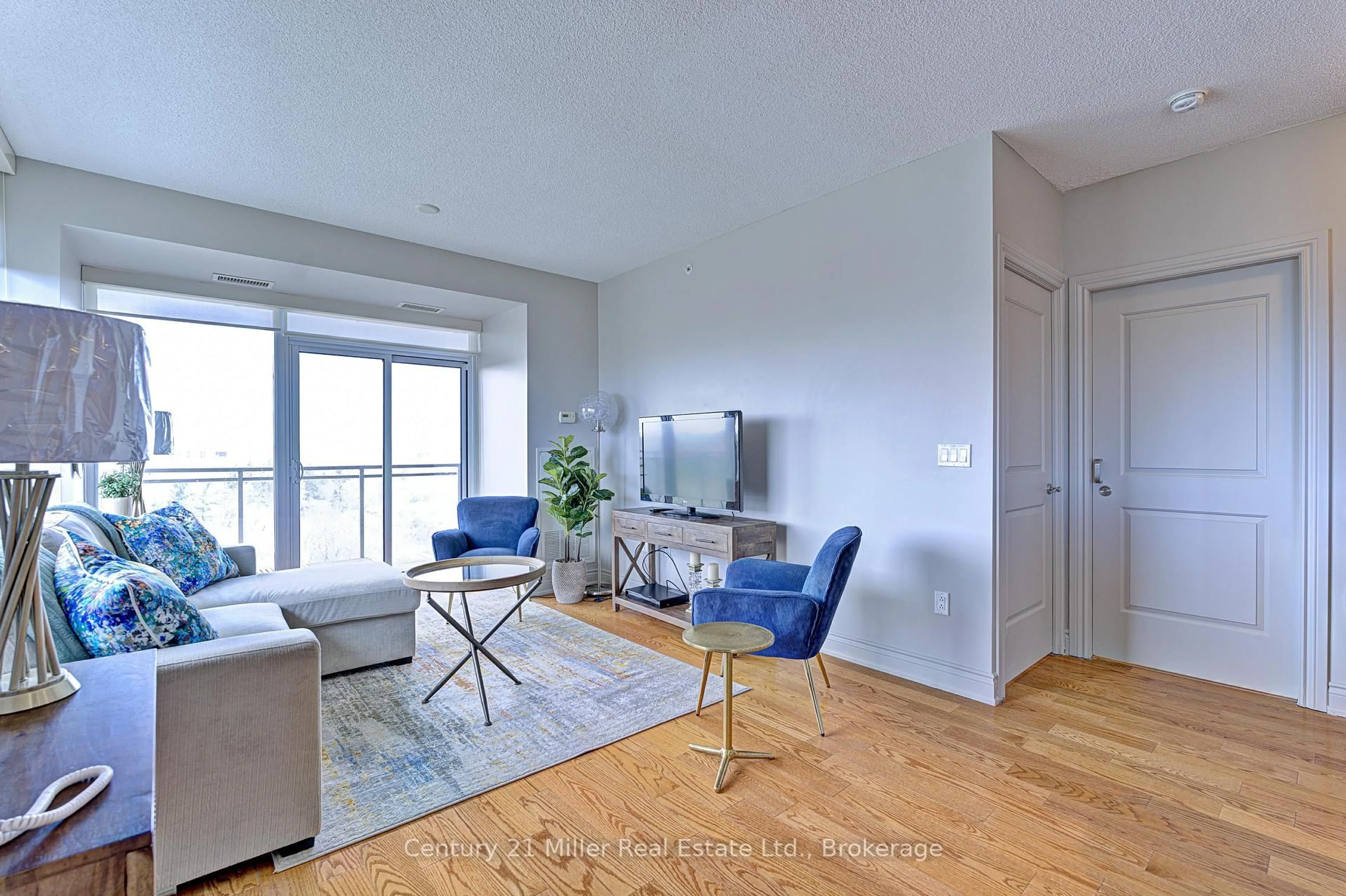 Living room with furniture, unknown for 1665 The Collegeway #1202, Mississauga Ontario L5L 0A9