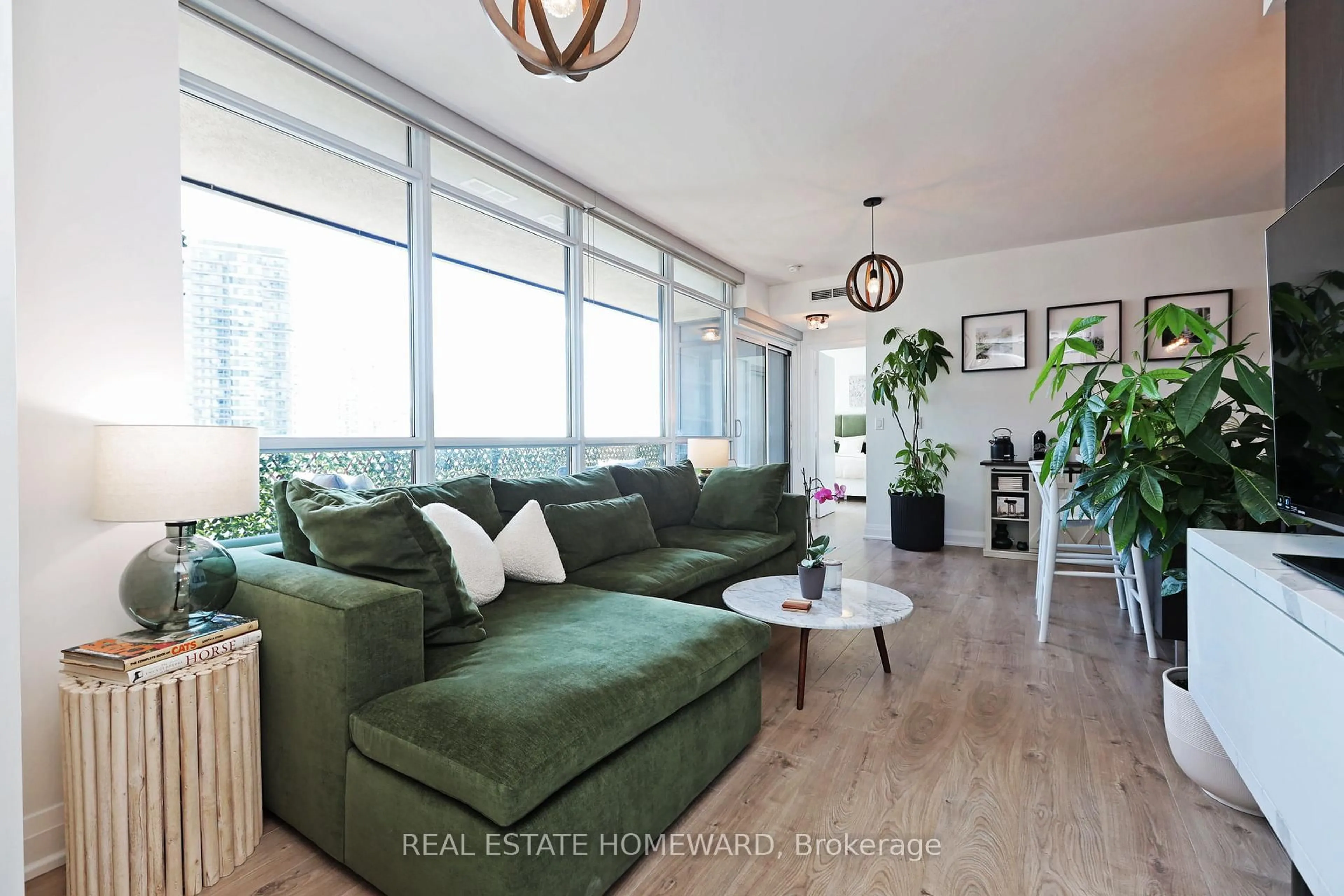 Living room with furniture, wood/laminate floor for 36 Park Lawn Ave #810, Toronto Ontario M8V 0E5