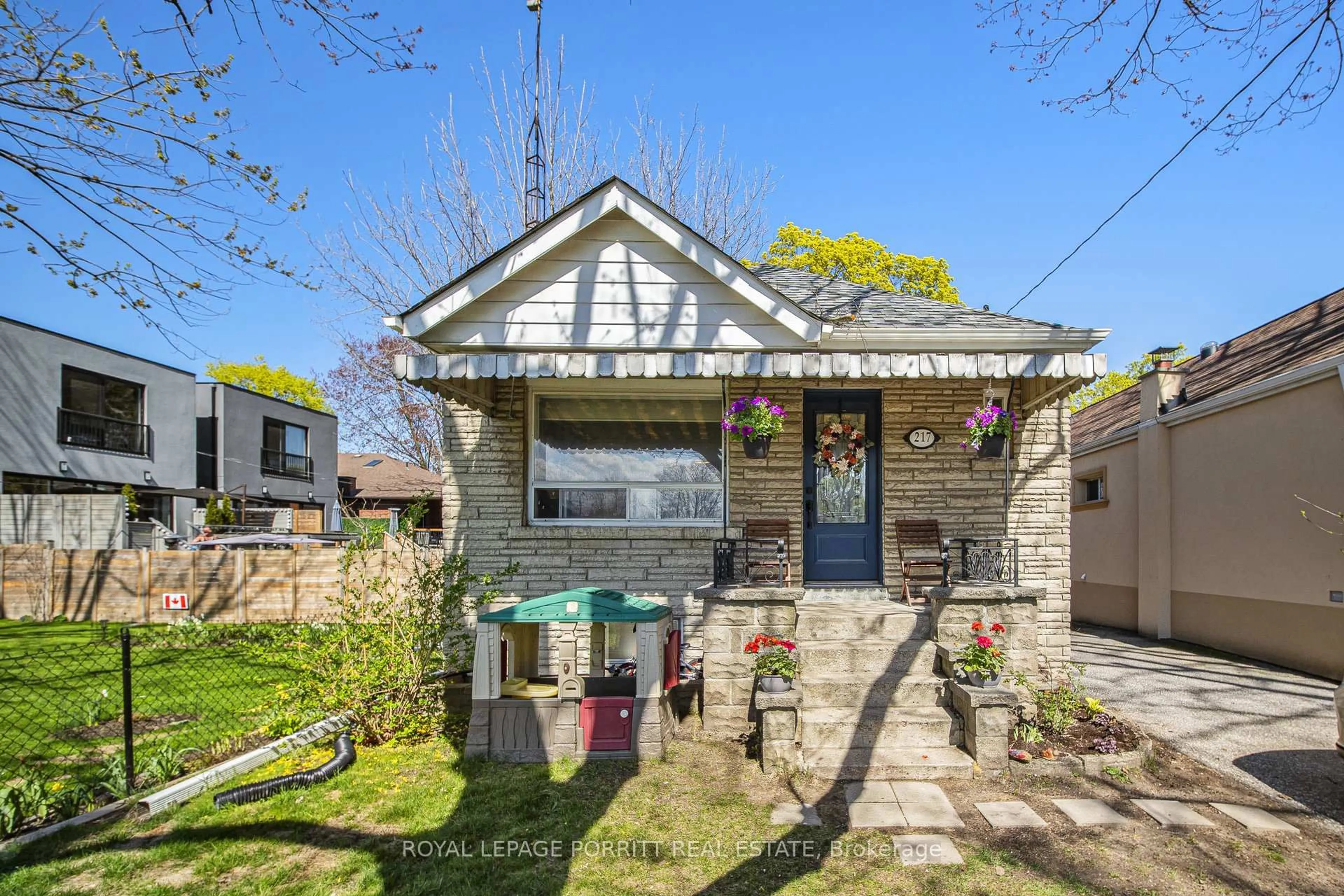 A pic from outside/outdoor area/front of a property/back of a property/a pic from drone, street for 217 Alderbrae Ave, Toronto Ontario M8W 4K4
