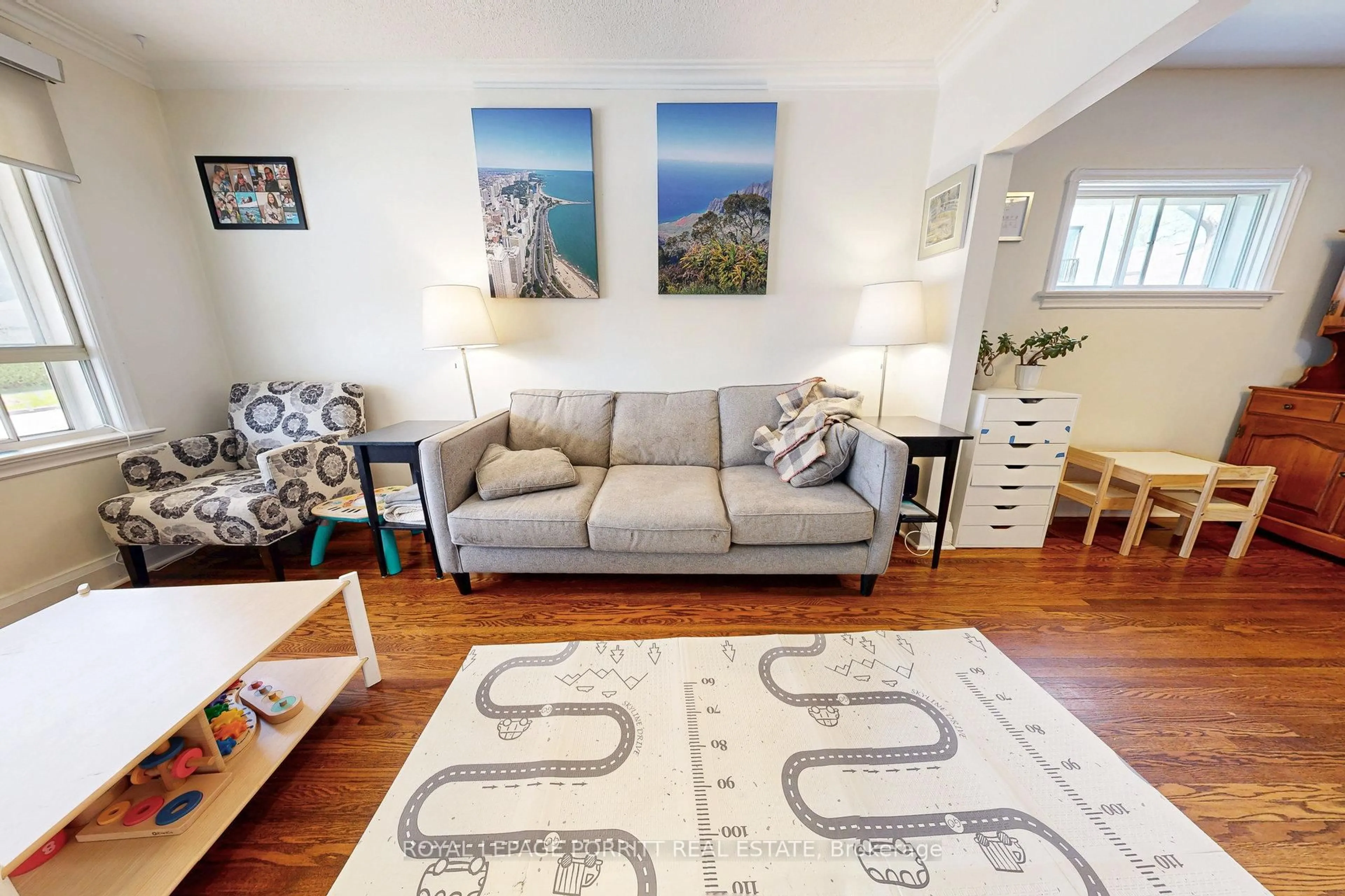 Living room with furniture, carpet floor for 217 Alderbrae Ave, Toronto Ontario M8W 4K4