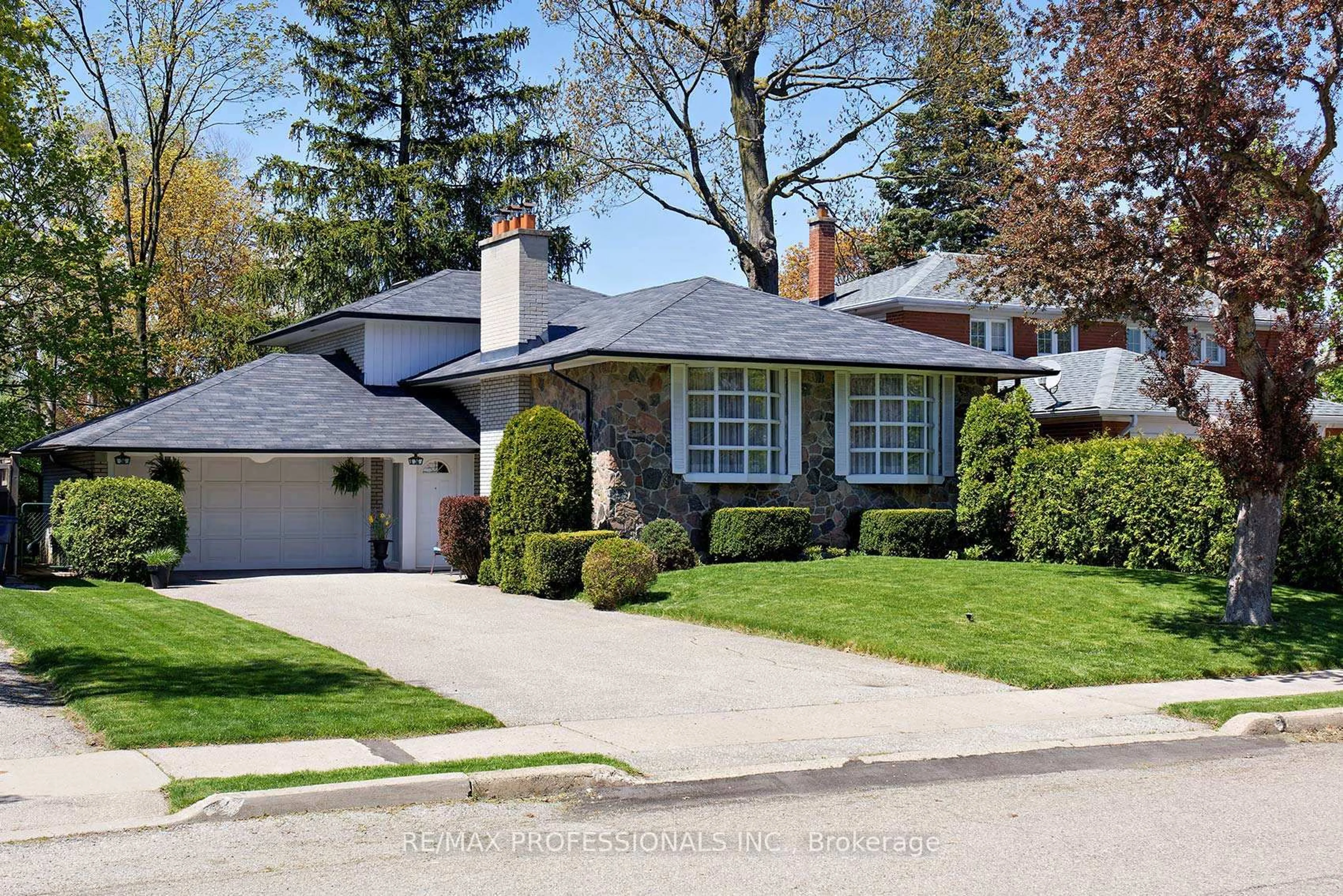 Home with brick exterior material, street for 36 Boxwood Rd, Toronto Ontario M9C 2W5