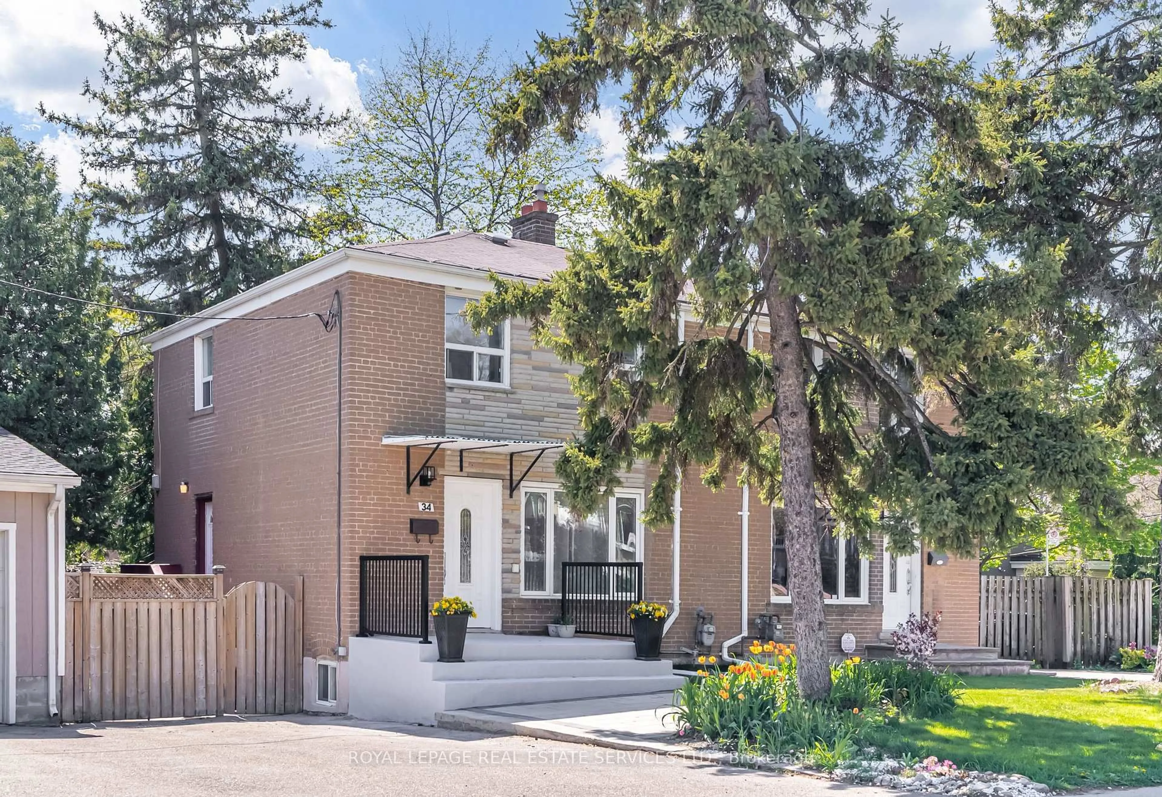 Home with brick exterior material, street for 34 Skylark Rd, Toronto Ontario M6S 4M4