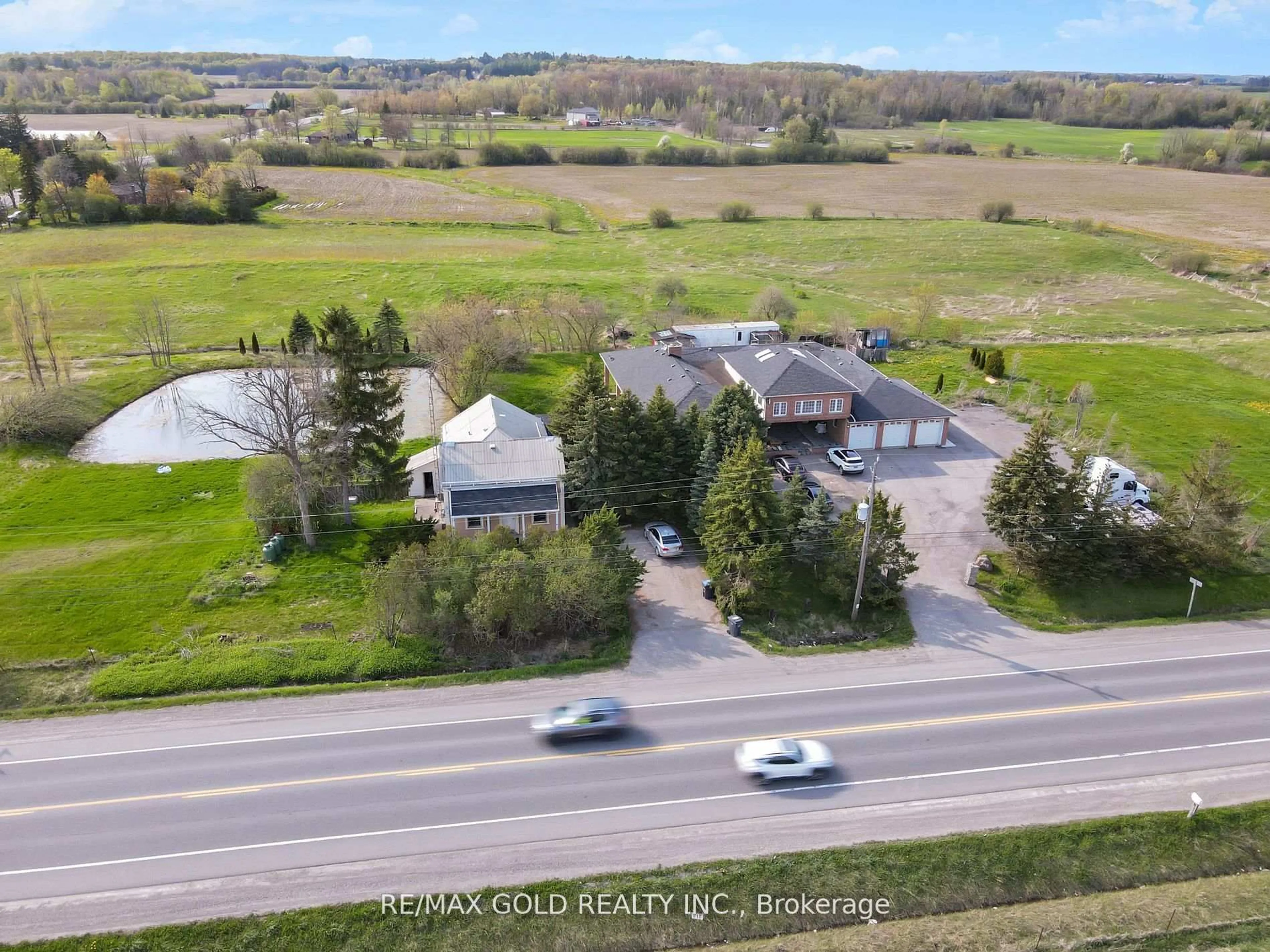 A pic from outside/outdoor area/front of a property/back of a property/a pic from drone, street for 7048 King St, Caledon Ontario L7C 0S3