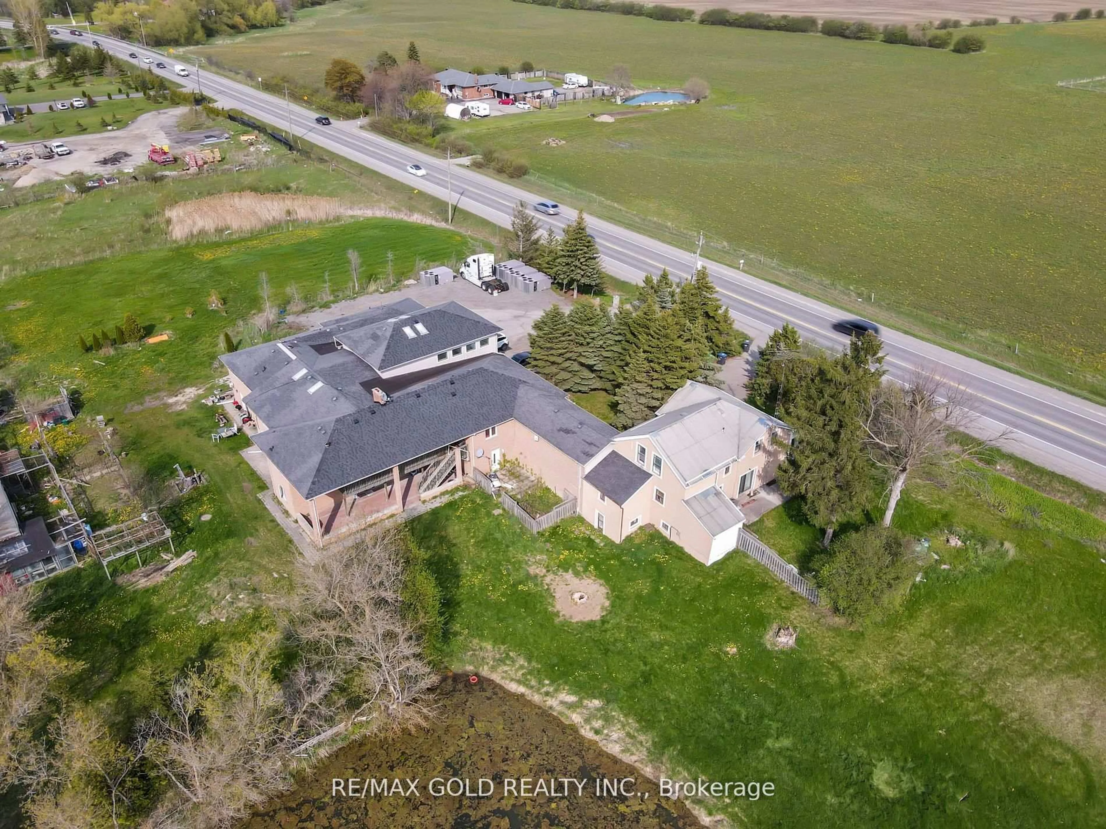 A pic from outside/outdoor area/front of a property/back of a property/a pic from drone, building for 7048 King St, Caledon Ontario L7C 0S3