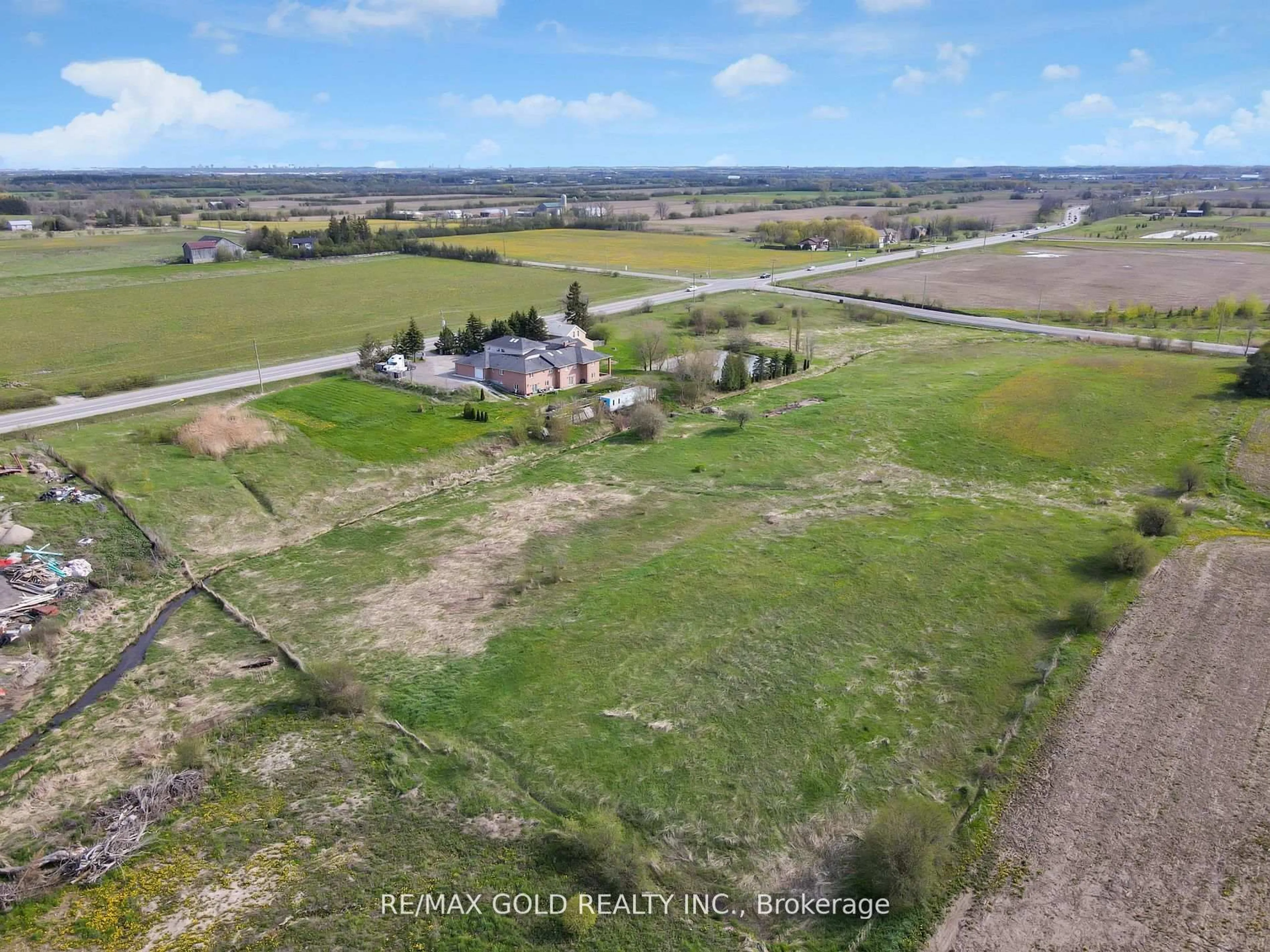 A pic from outside/outdoor area/front of a property/back of a property/a pic from drone, mountain view for 7048 King St, Caledon Ontario L7C 0S3