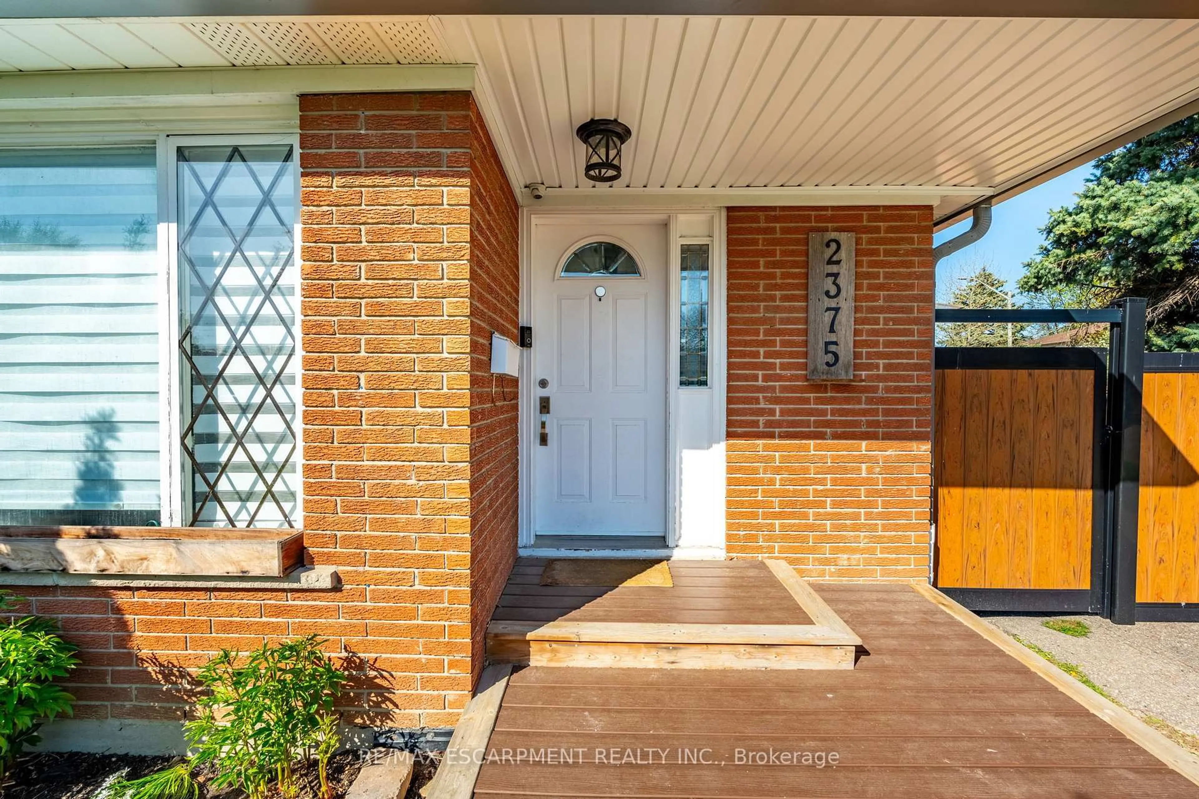 Home with brick exterior material, street for 2375 Gareth Rd, Mississauga Ontario L5B 1Z4