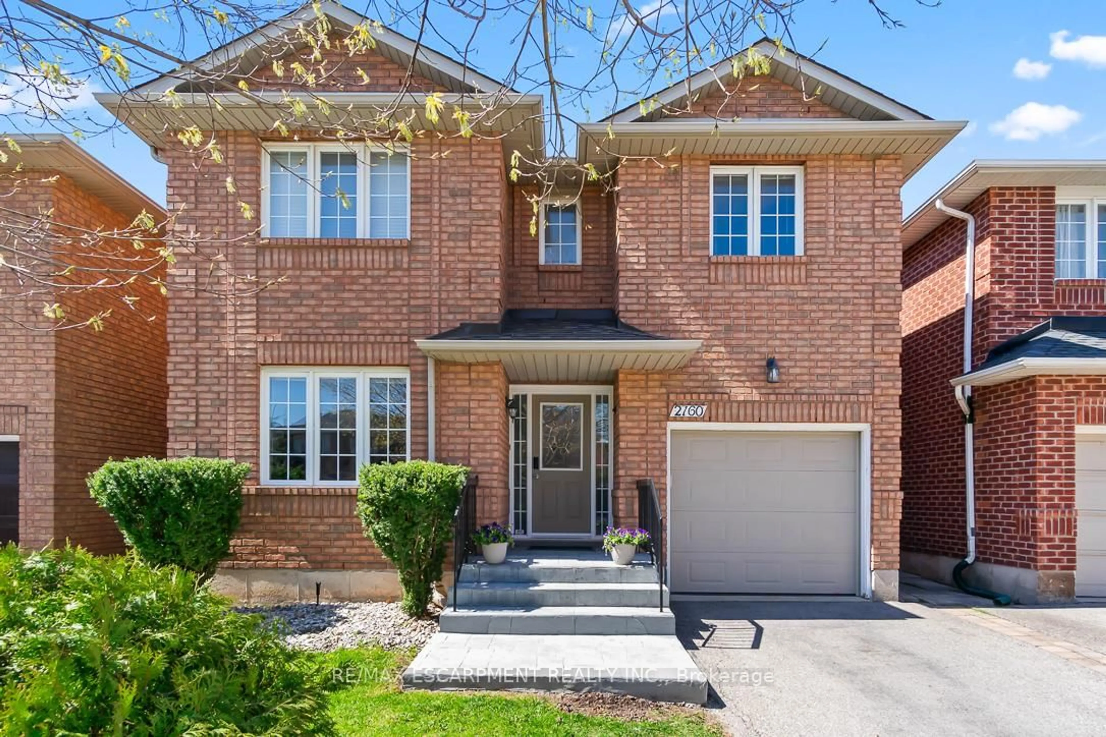 Home with brick exterior material, street for 2160 Peach Tree Lane, Oakville Ontario L6M 3W7
