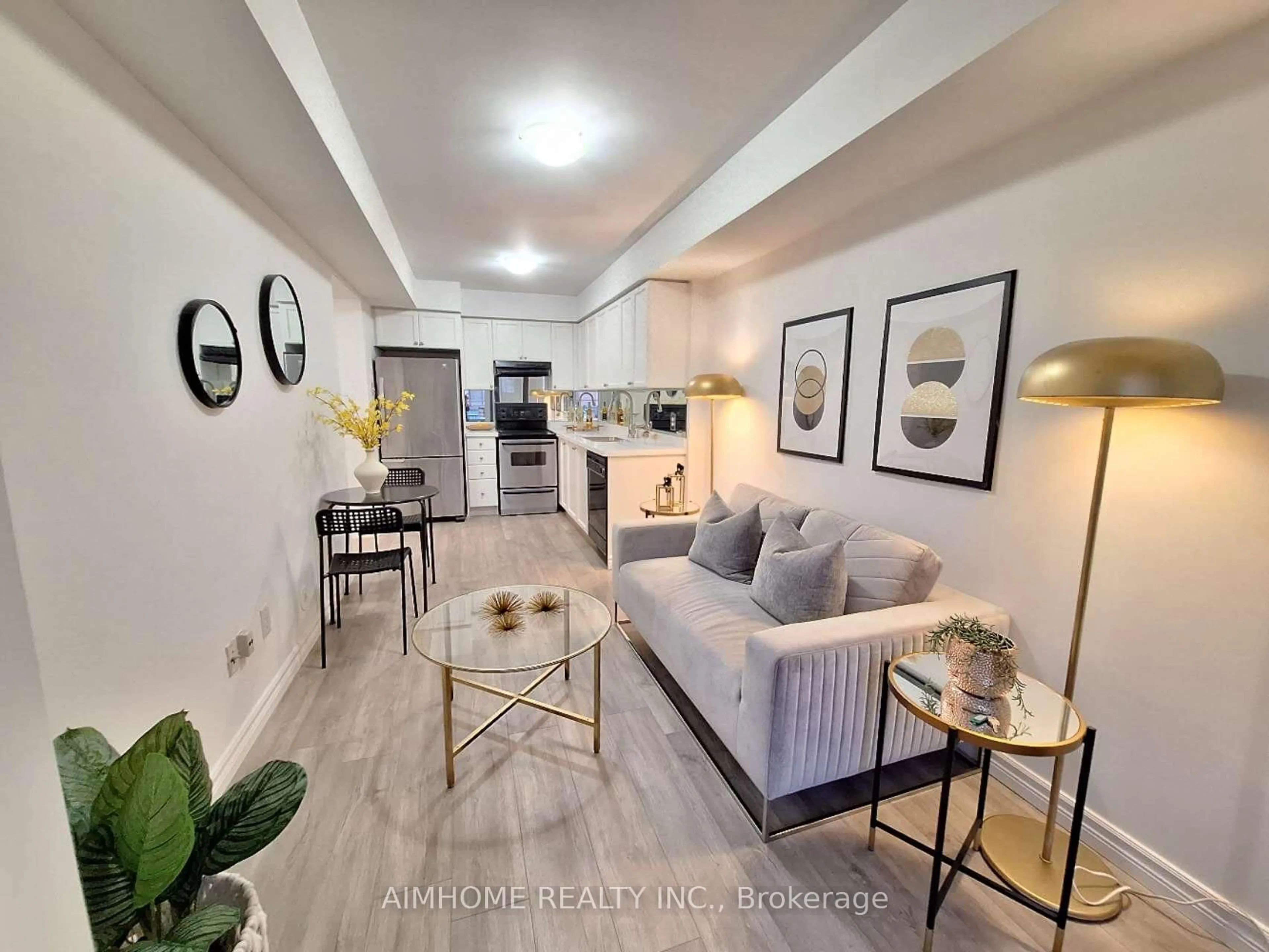 Living room with furniture, unknown for 4975 Southampton Dr #318, Mississauga Ontario L5M 8E6