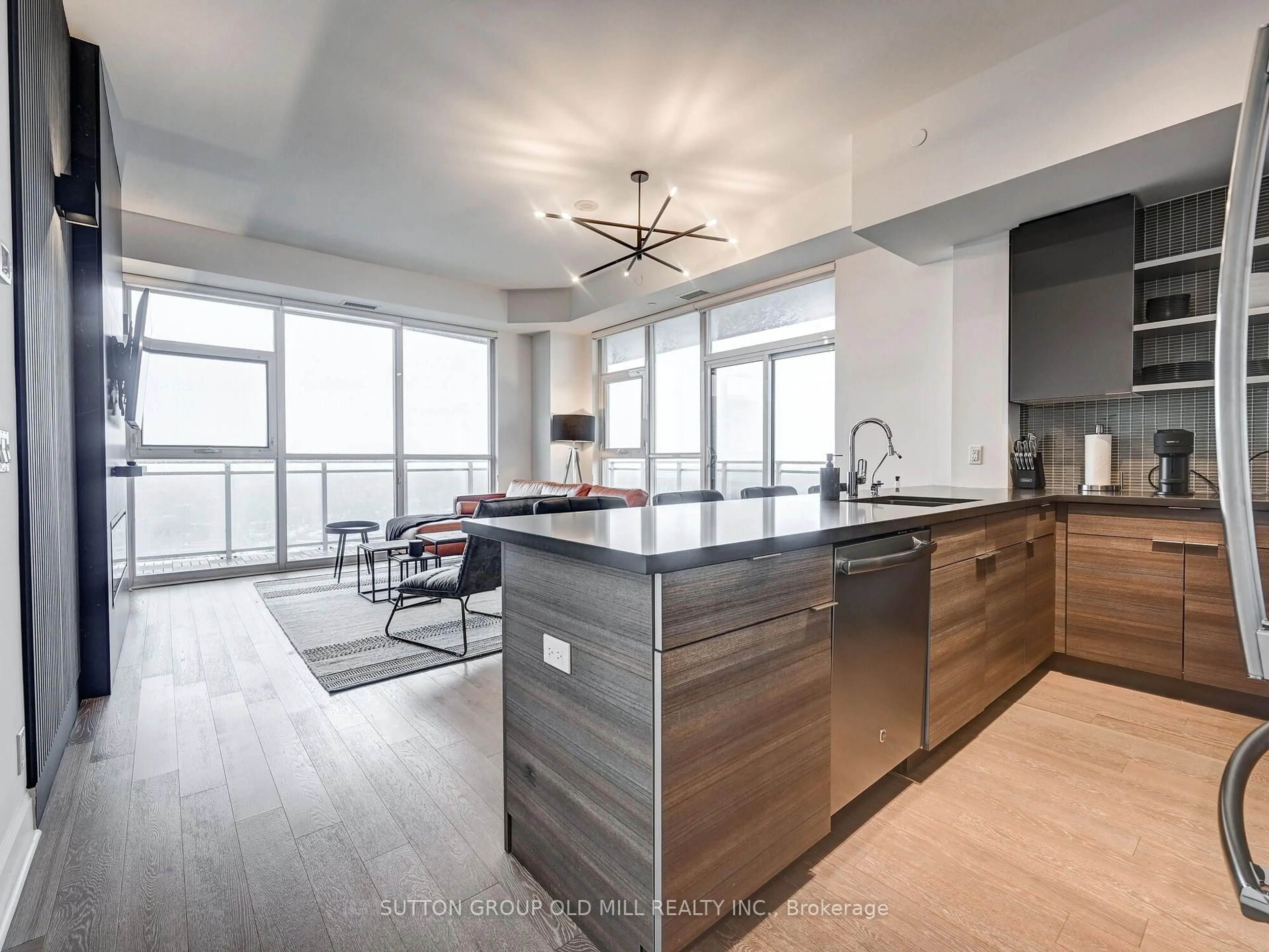Open concept kitchen, wood/laminate floor for 33 Shore Breeze Dr #3704, Toronto Ontario M8V 0G1