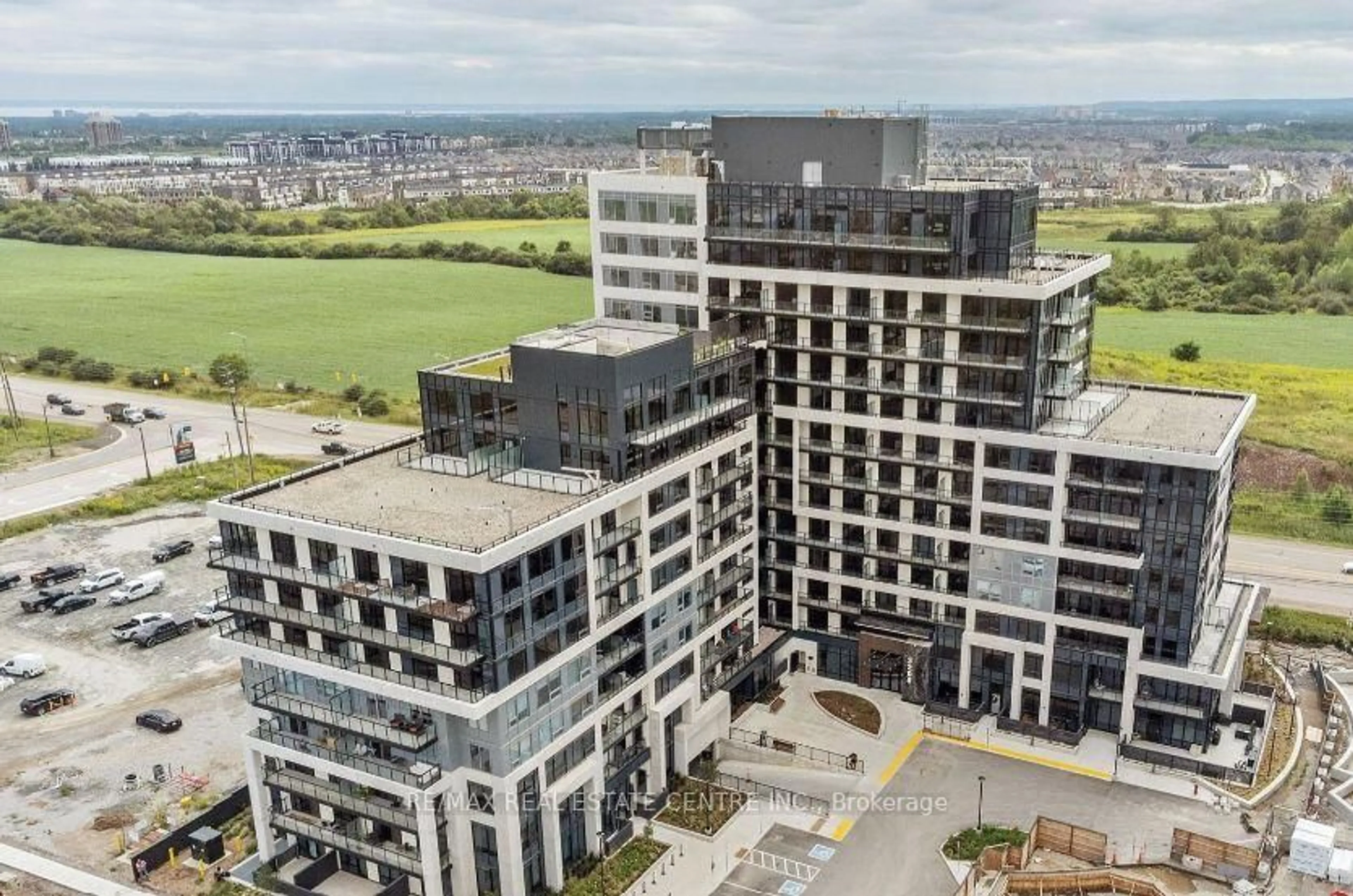 A pic from outside/outdoor area/front of a property/back of a property/a pic from drone, city buildings view from balcony for 3200 William Coltson Ave #917, Oakville Ontario L6H 7W6