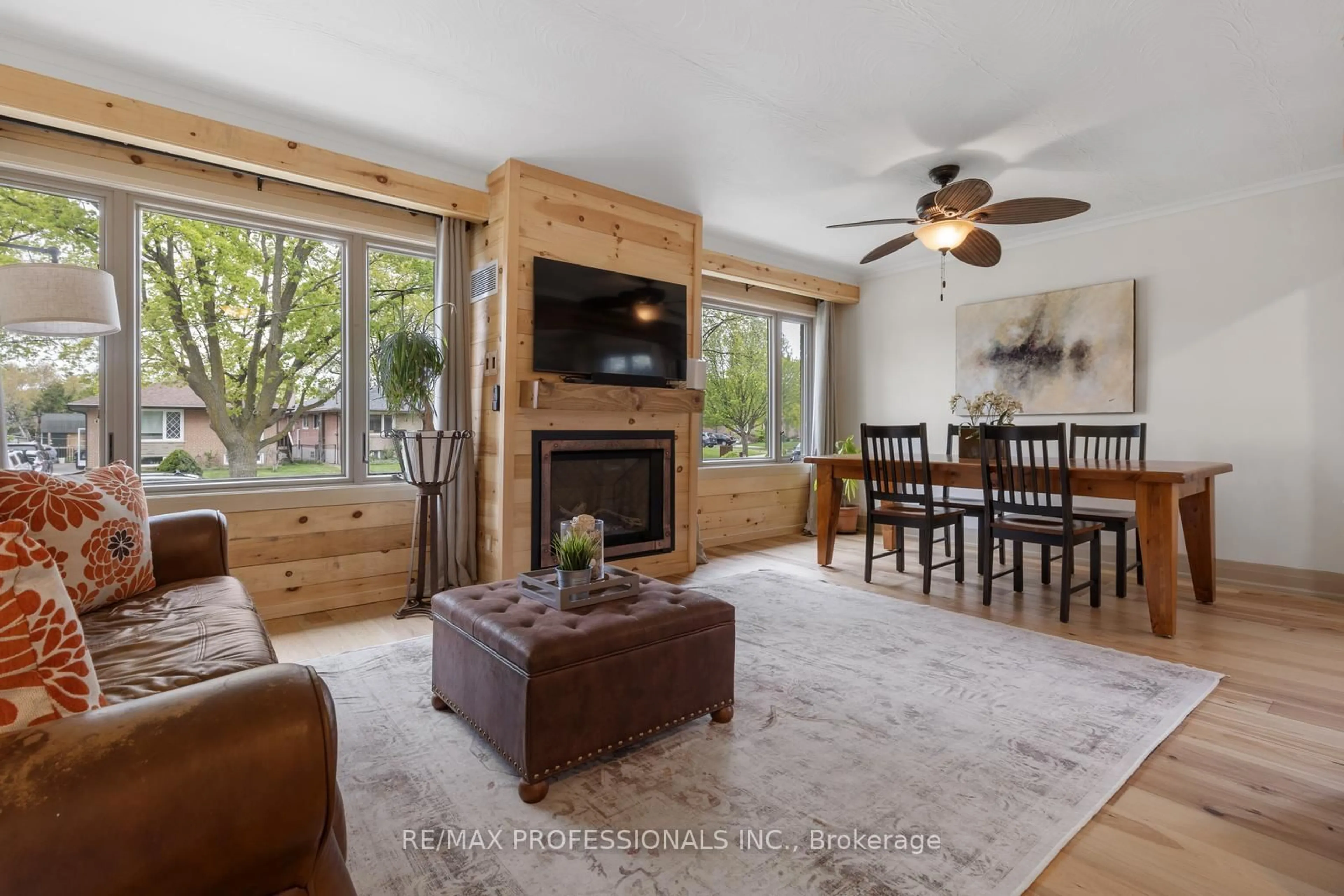 Living room with furniture, wood/laminate floor for 3 Littlewood Cres, Toronto Ontario M9C 4A9