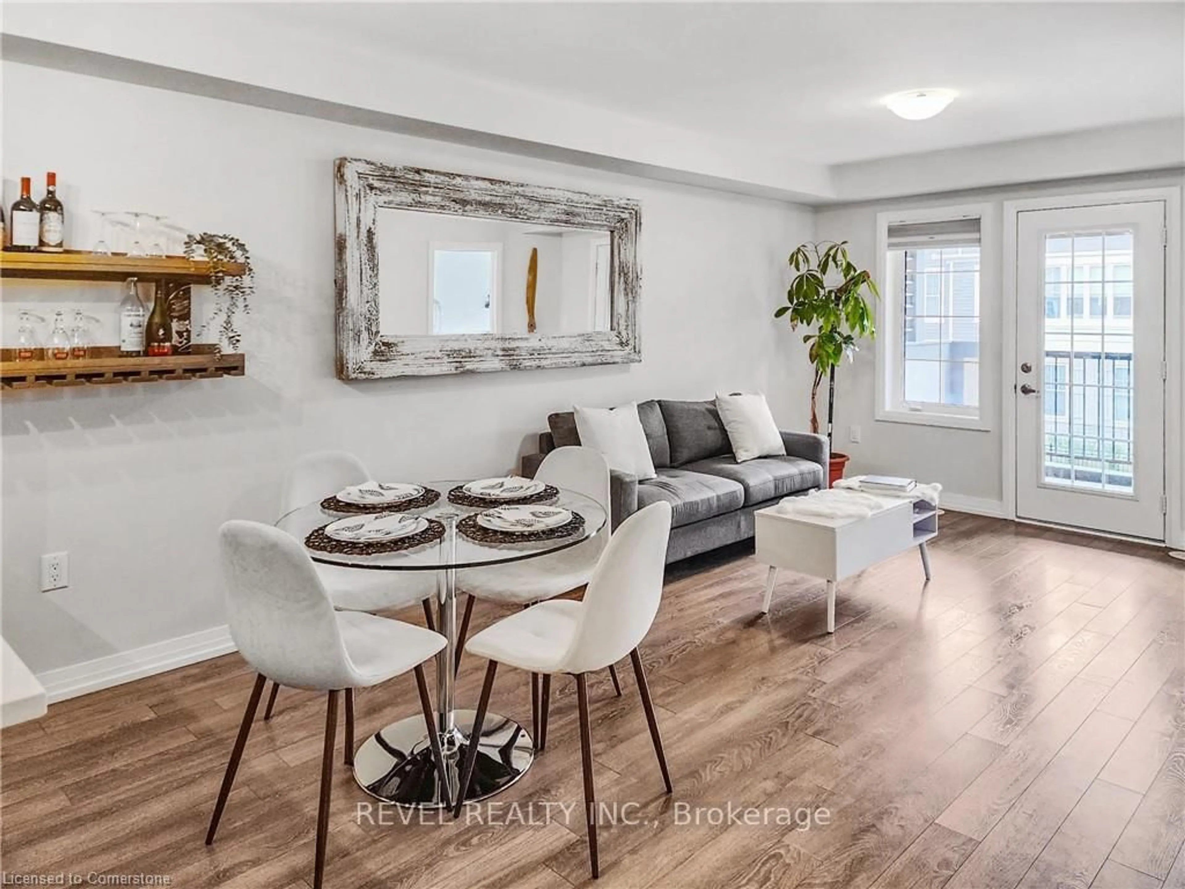 Living room with furniture, wood/laminate floor for 504 Buckeye Crt, Milton Ontario L9T 7E7
