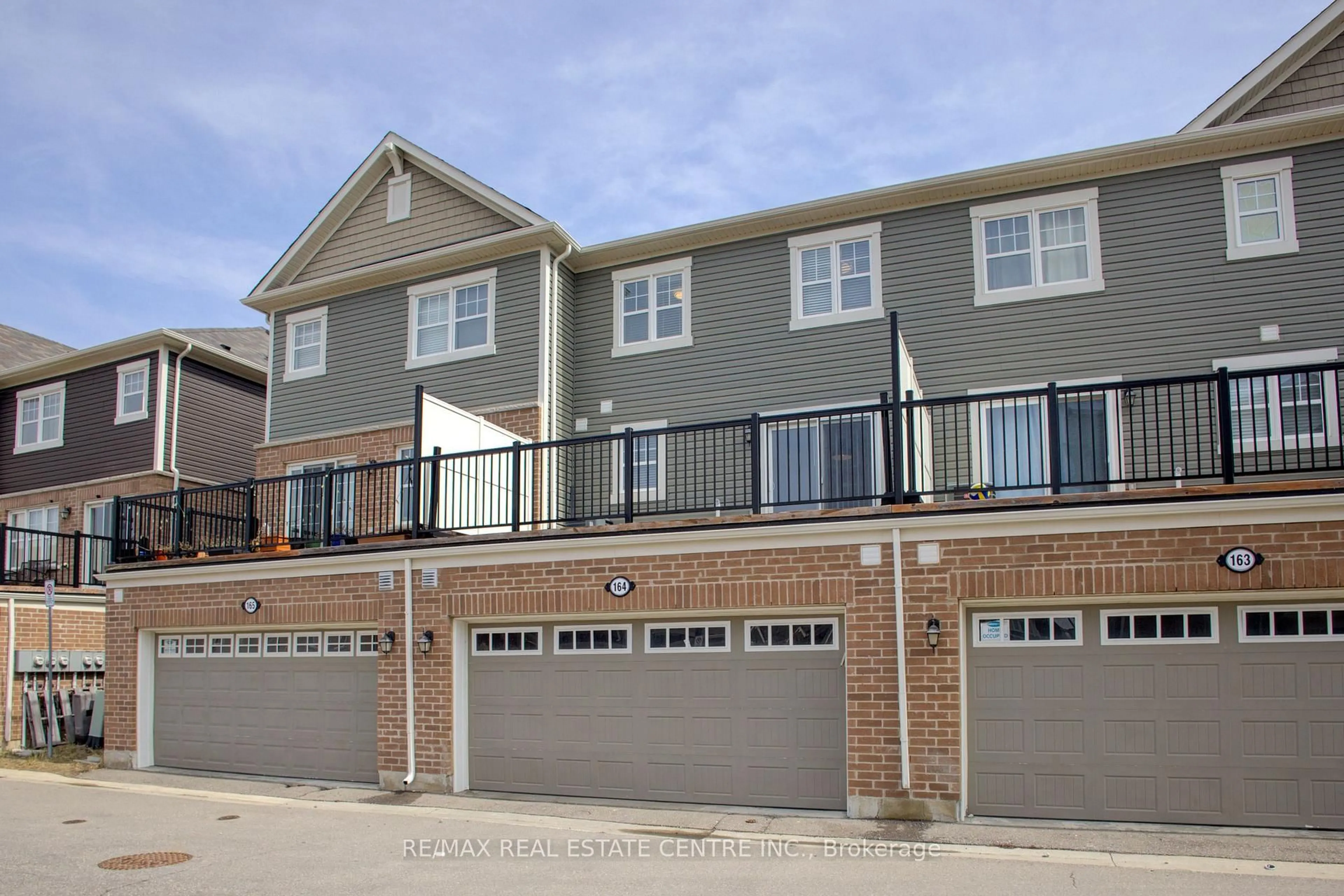 Home with brick exterior material, street for 1000 Asleton Blvd #164, Milton Ontario L9T 9L3