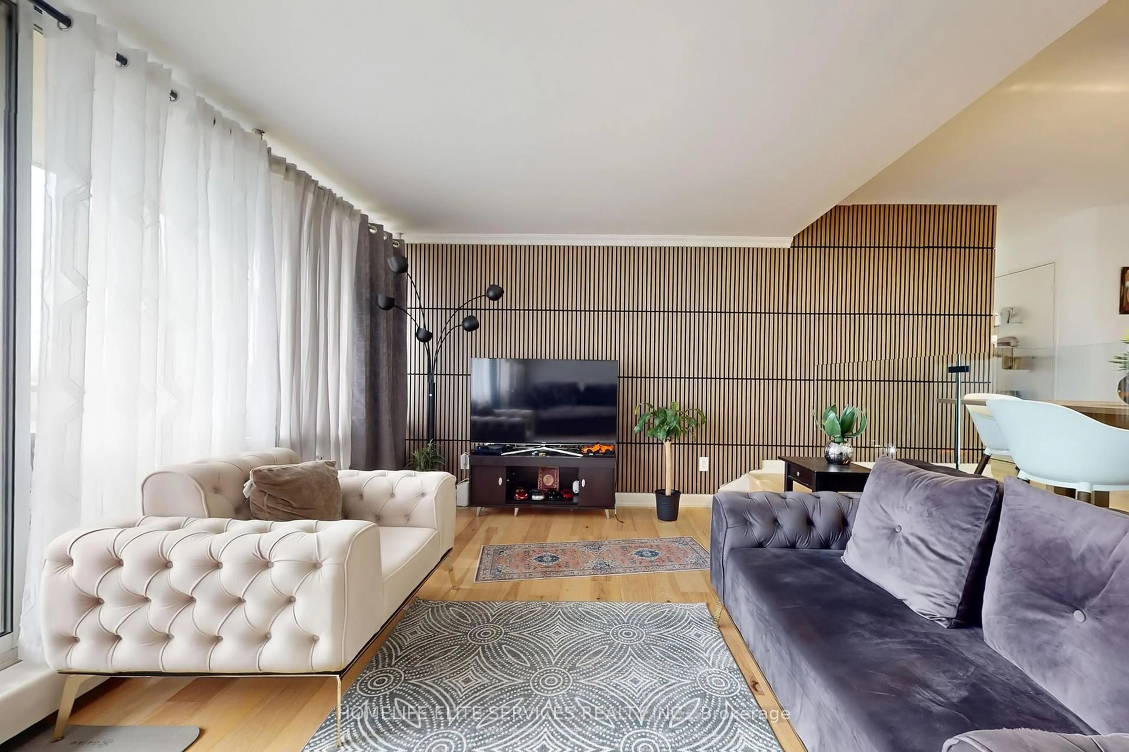 Living room with furniture, unknown for 19 Four Winds Dr #813, Toronto Ontario M3J 2S9