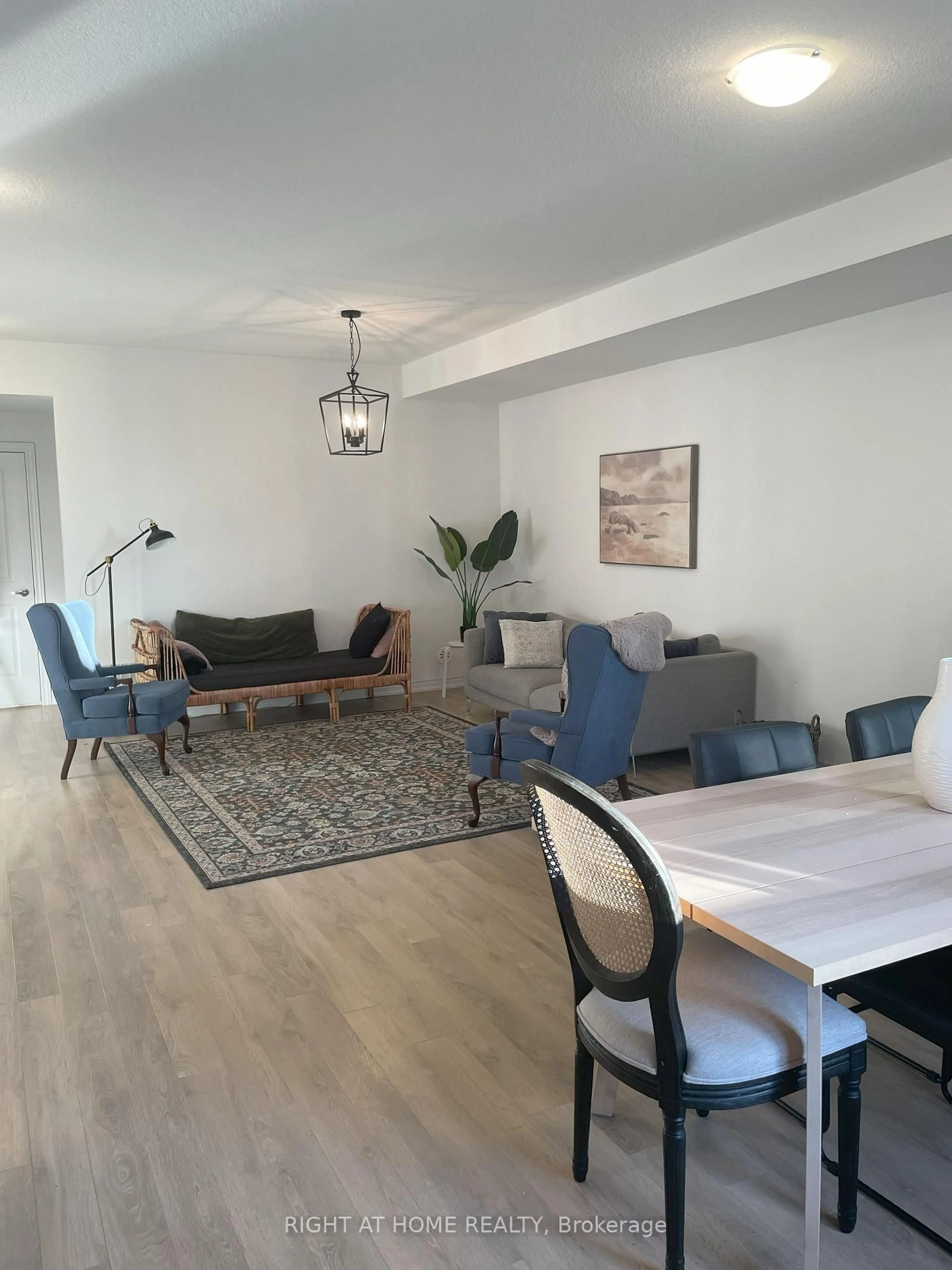 Living room with furniture, wood/laminate floor for 9440 The Gore Rd #45, Brampton Ontario L6P 4P9