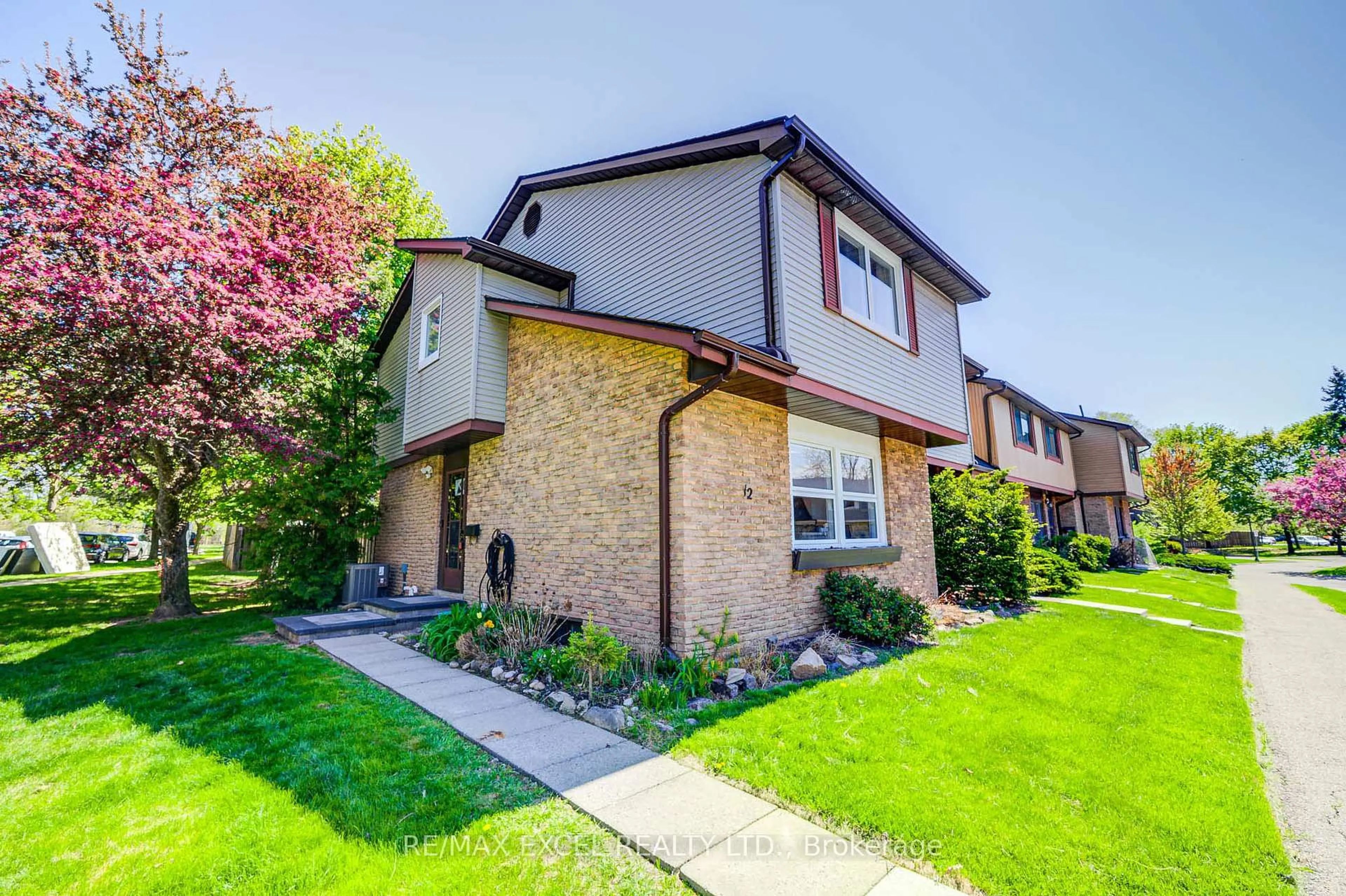 Home with brick exterior material, street for 6433 Charing Dr #12, Mississauga Ontario L5N 1L6