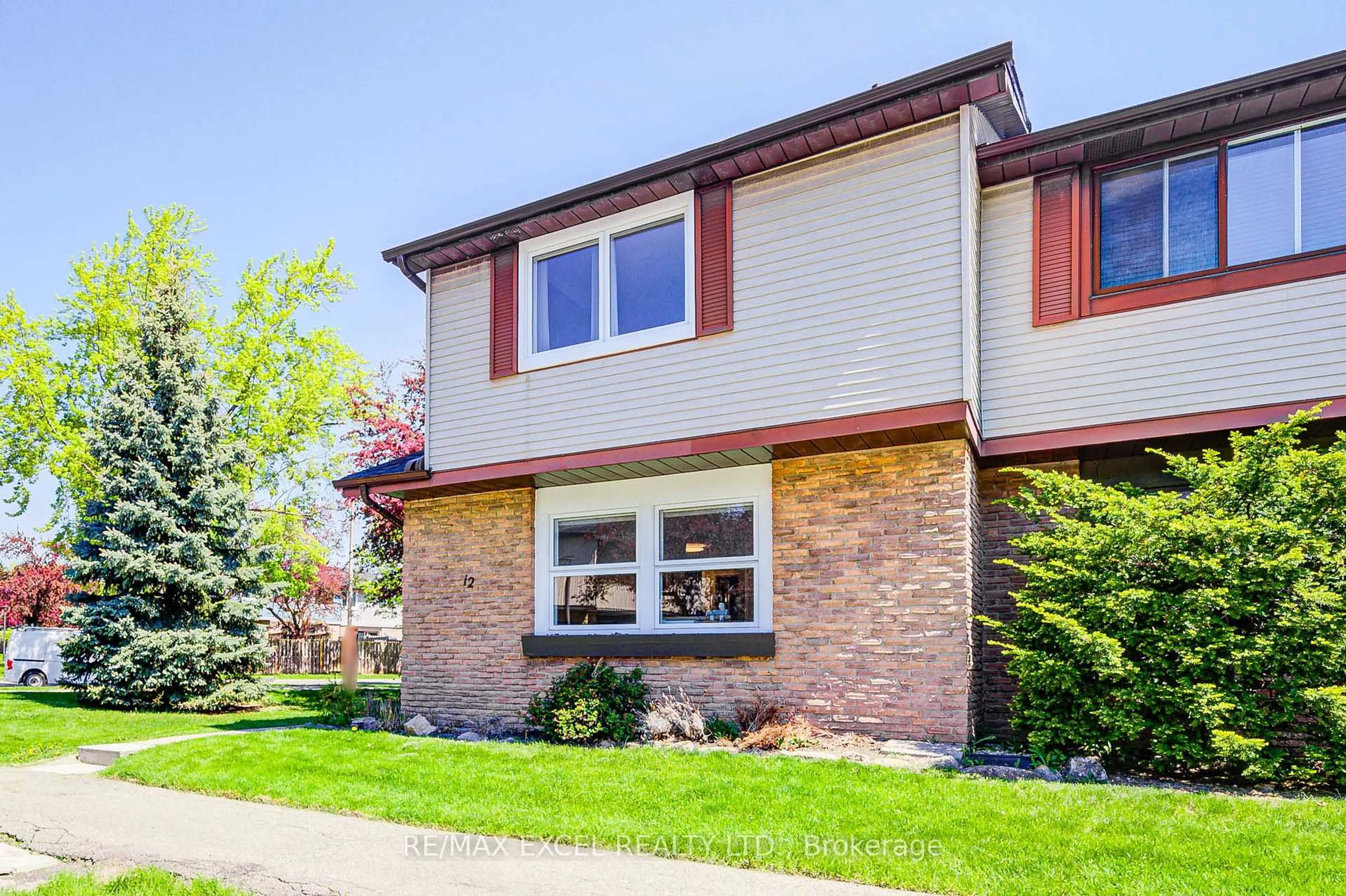Home with brick exterior material, street for 6433 Charing Dr #12, Mississauga Ontario L5N 1L6