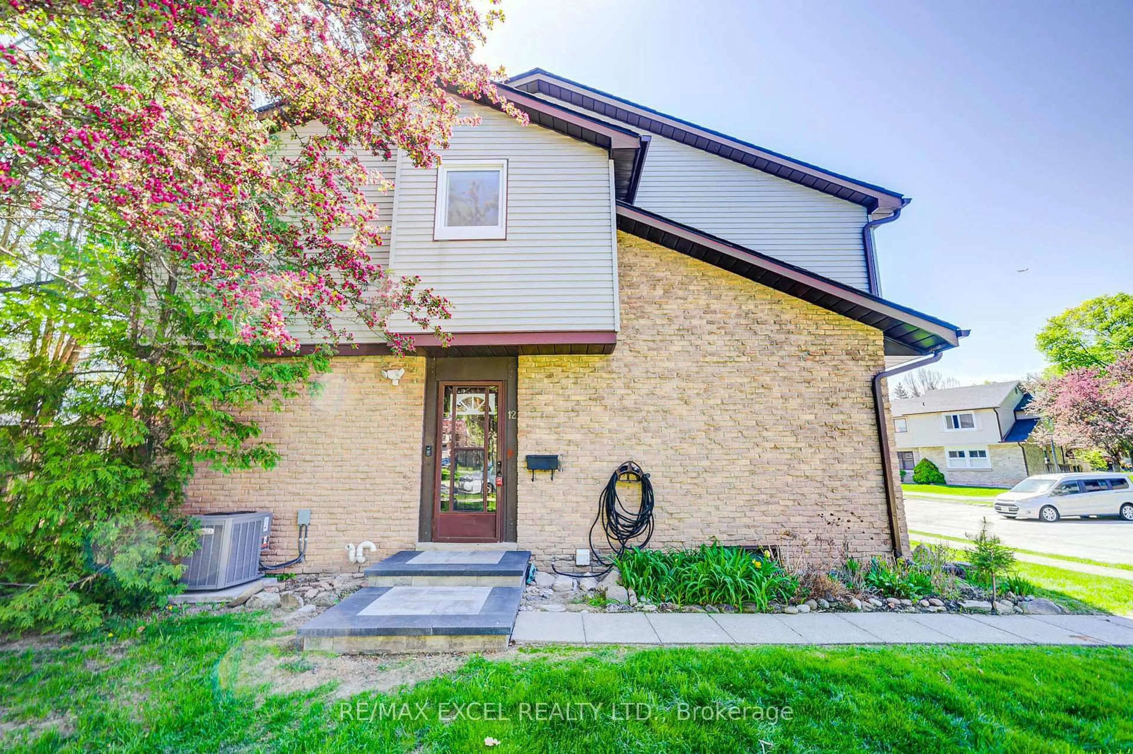 Home with brick exterior material, street for 6433 Charing Dr #12, Mississauga Ontario L5N 1L6