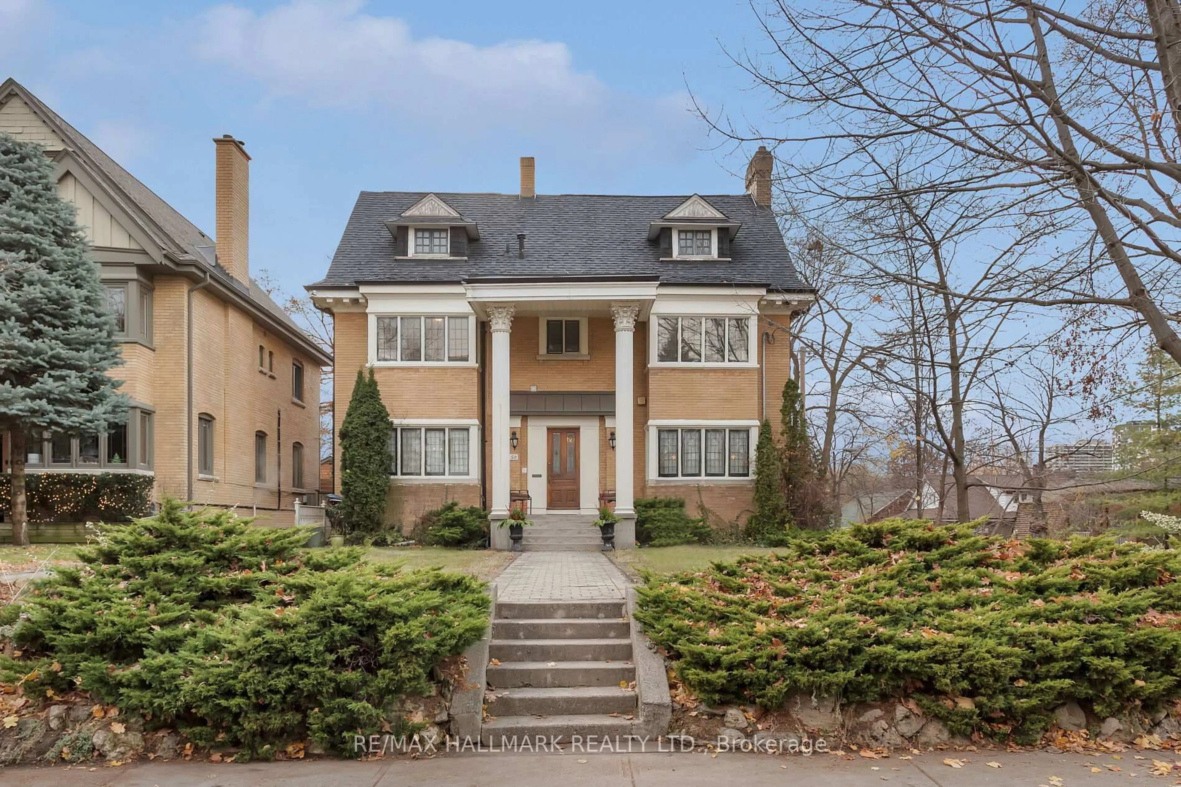 Home with brick exterior material, street for 60 Indian Grve, Toronto Ontario M6R 2Y3
