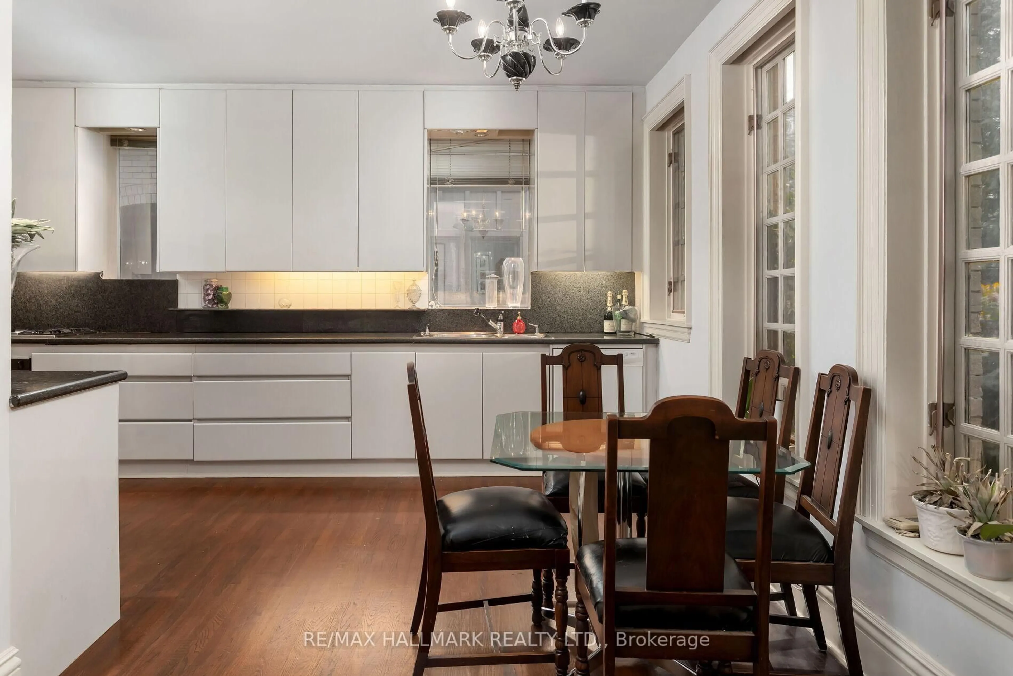 Open concept kitchen, wood/laminate floor for 60 Indian Grve, Toronto Ontario M6R 2Y3