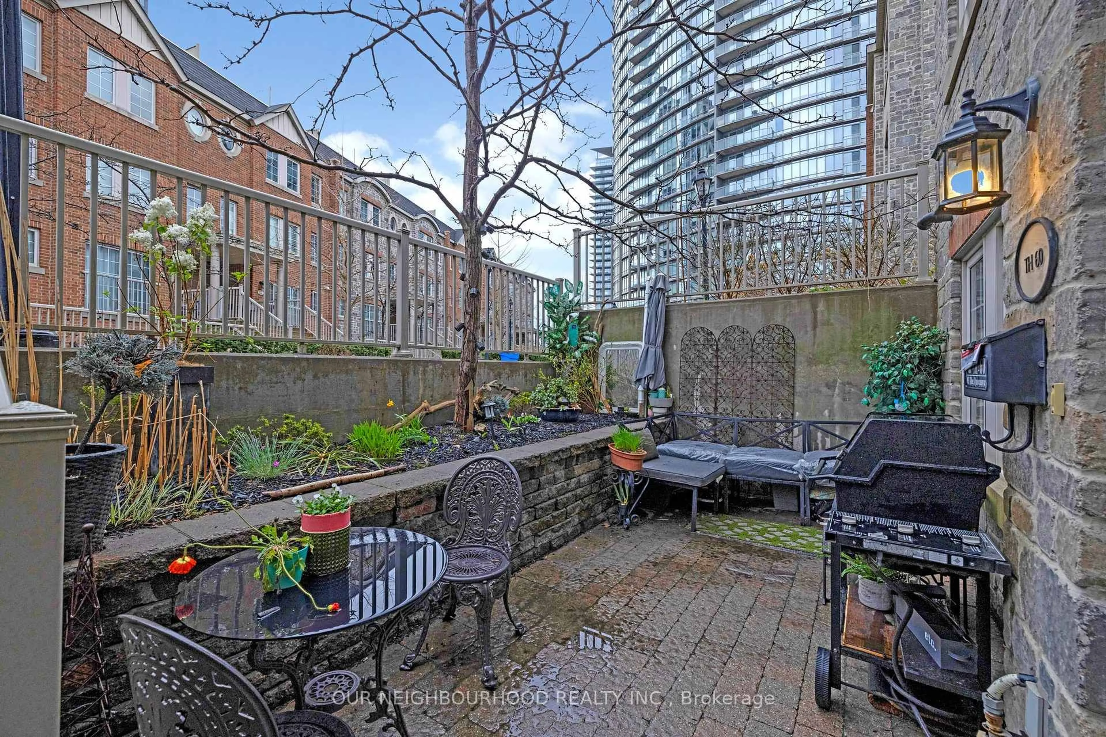 Patio, city buildings view from balcony for 93 The Queensway Ave #TH60, Toronto Ontario M6S 5A7