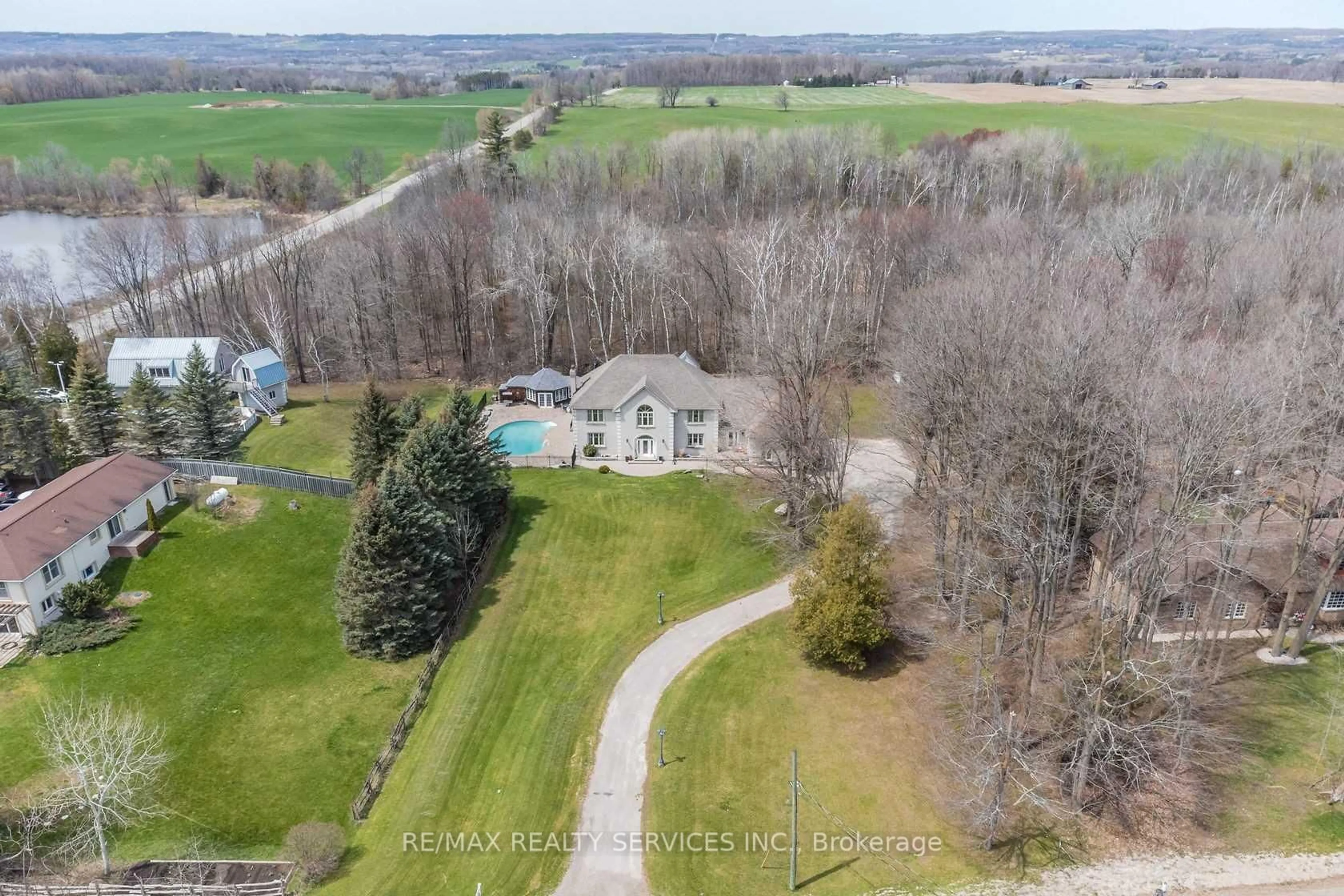 A pic from outside/outdoor area/front of a property/back of a property/a pic from drone, water/lake/river/ocean view for 4032 Boston Mills Rd, Caledon Ontario L7C 0M5