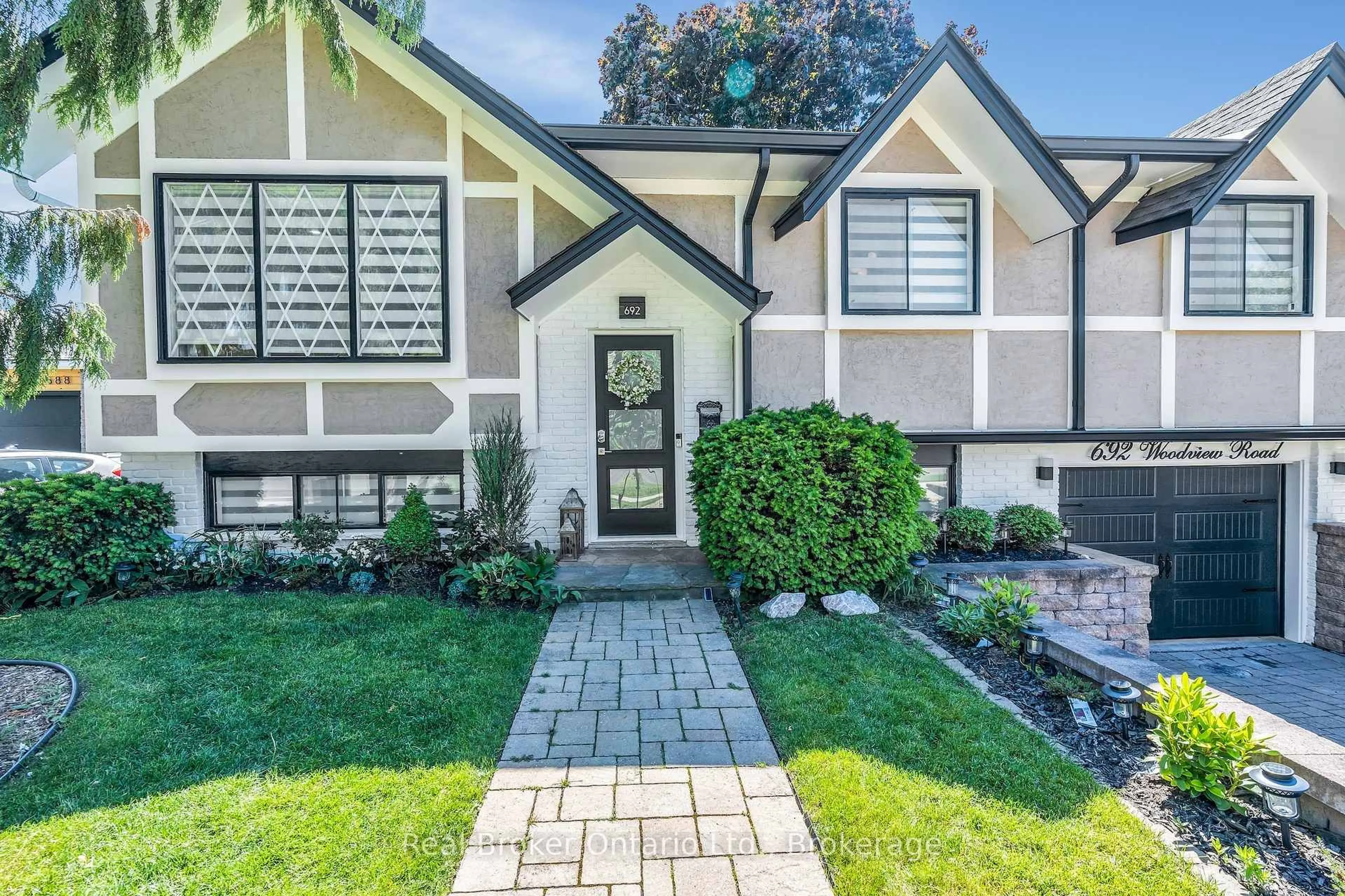 Home with vinyl exterior material, street for 692 Woodview Rd, Burlington Ontario L7N 3A5