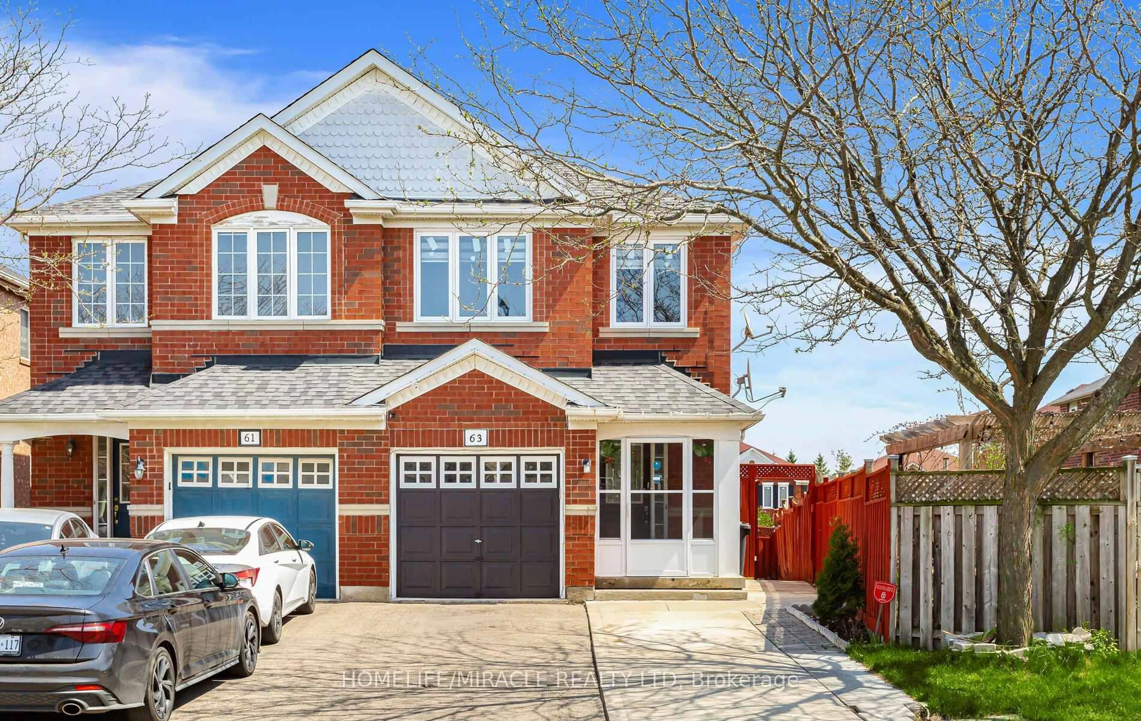 Home with brick exterior material, street for 63 Feather Reed Way, Brampton Ontario L6R 2Z7