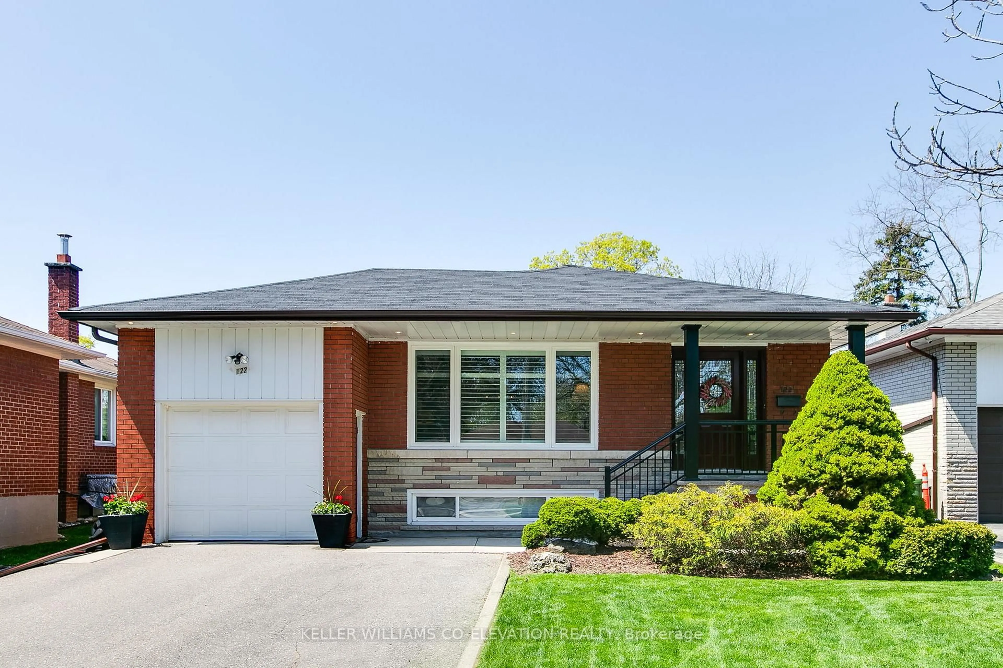 Home with brick exterior material, street for 122 Sun Row Dr, Toronto Ontario M9P 3J6