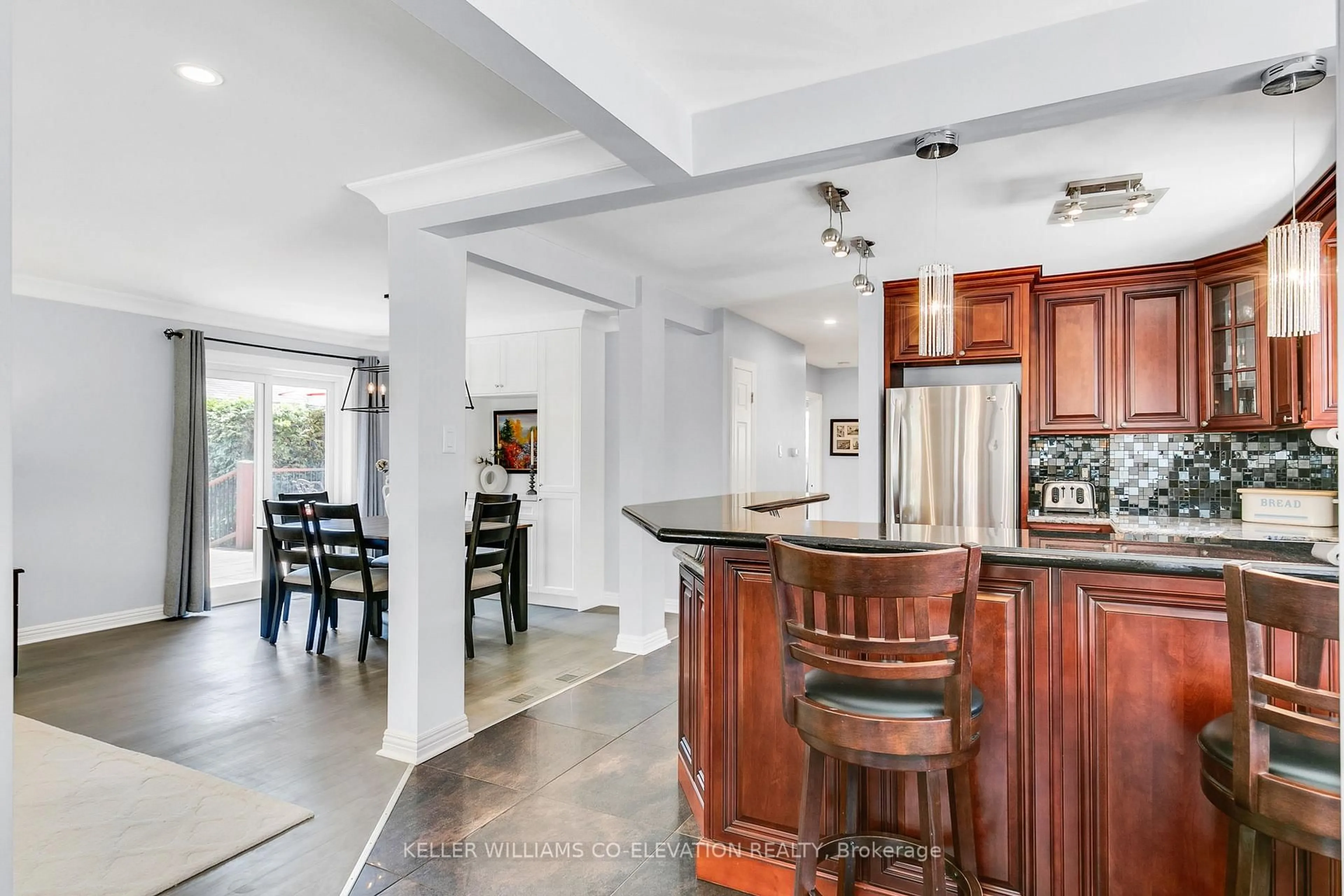 Open concept kitchen, ceramic/tile floor for 122 Sun Row Dr, Toronto Ontario M9P 3J6