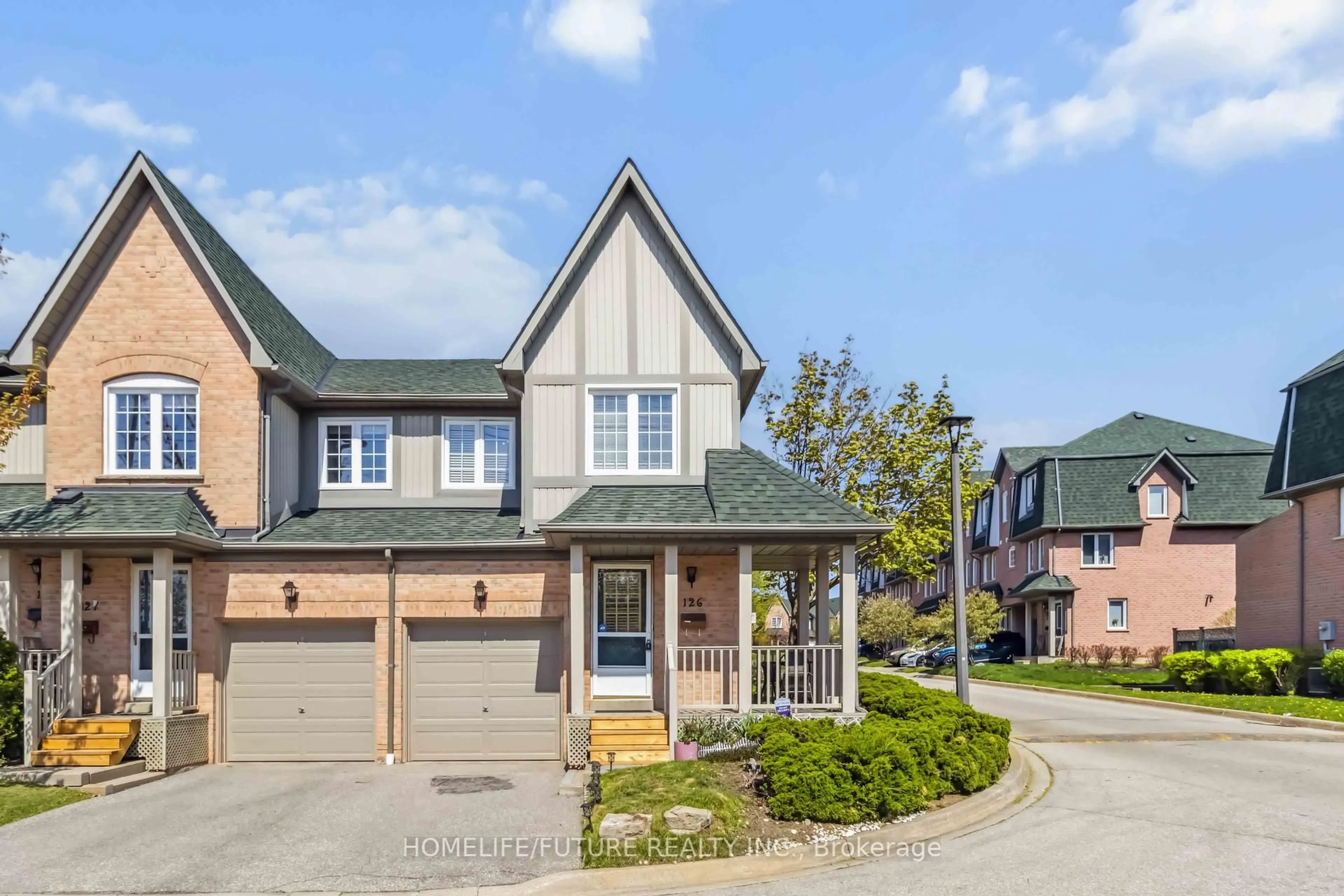 Home with brick exterior material, street for 2945 Thomas St #TH 126, Mississauga Ontario L5M 6C1