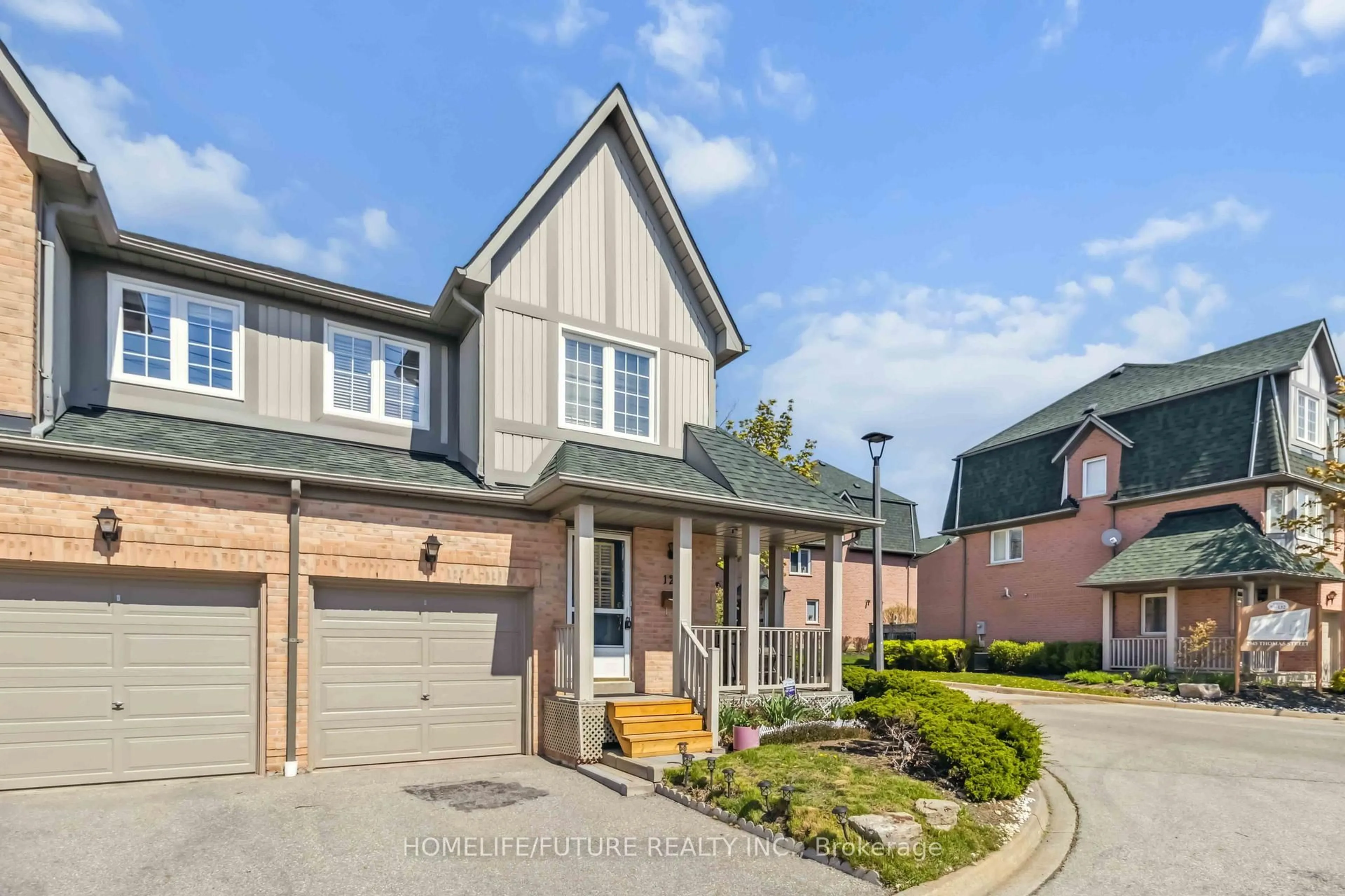 Home with brick exterior material, street for 2945 Thomas St #TH 126, Mississauga Ontario L5M 6C1
