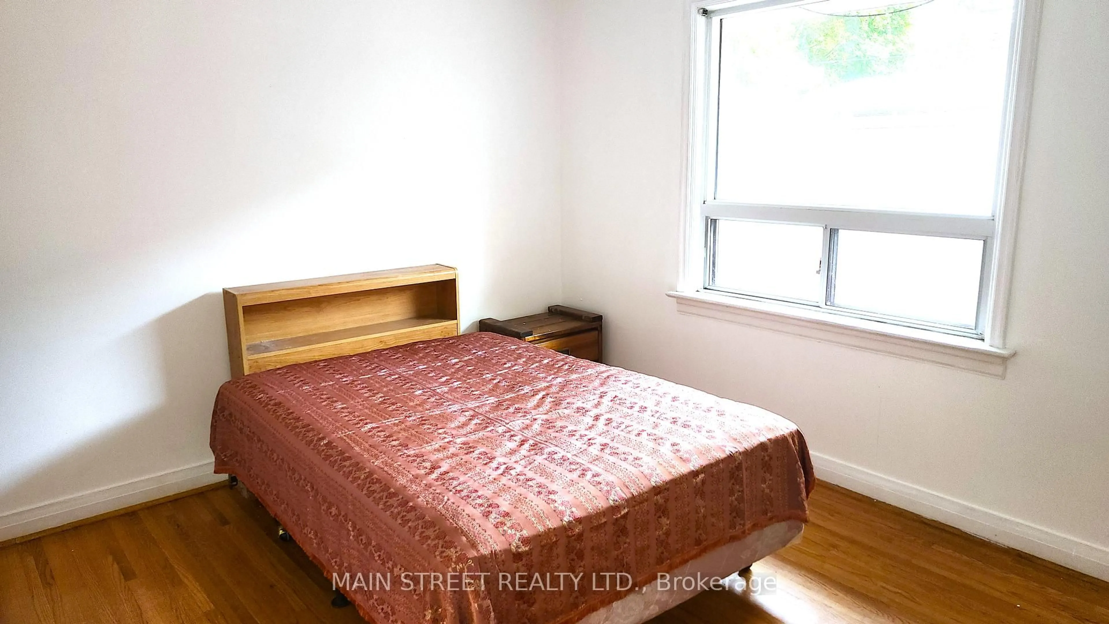 Bedroom with bed, wood/laminate floor for 37 Fairlin Dr, Toronto Ontario M9B 4J4