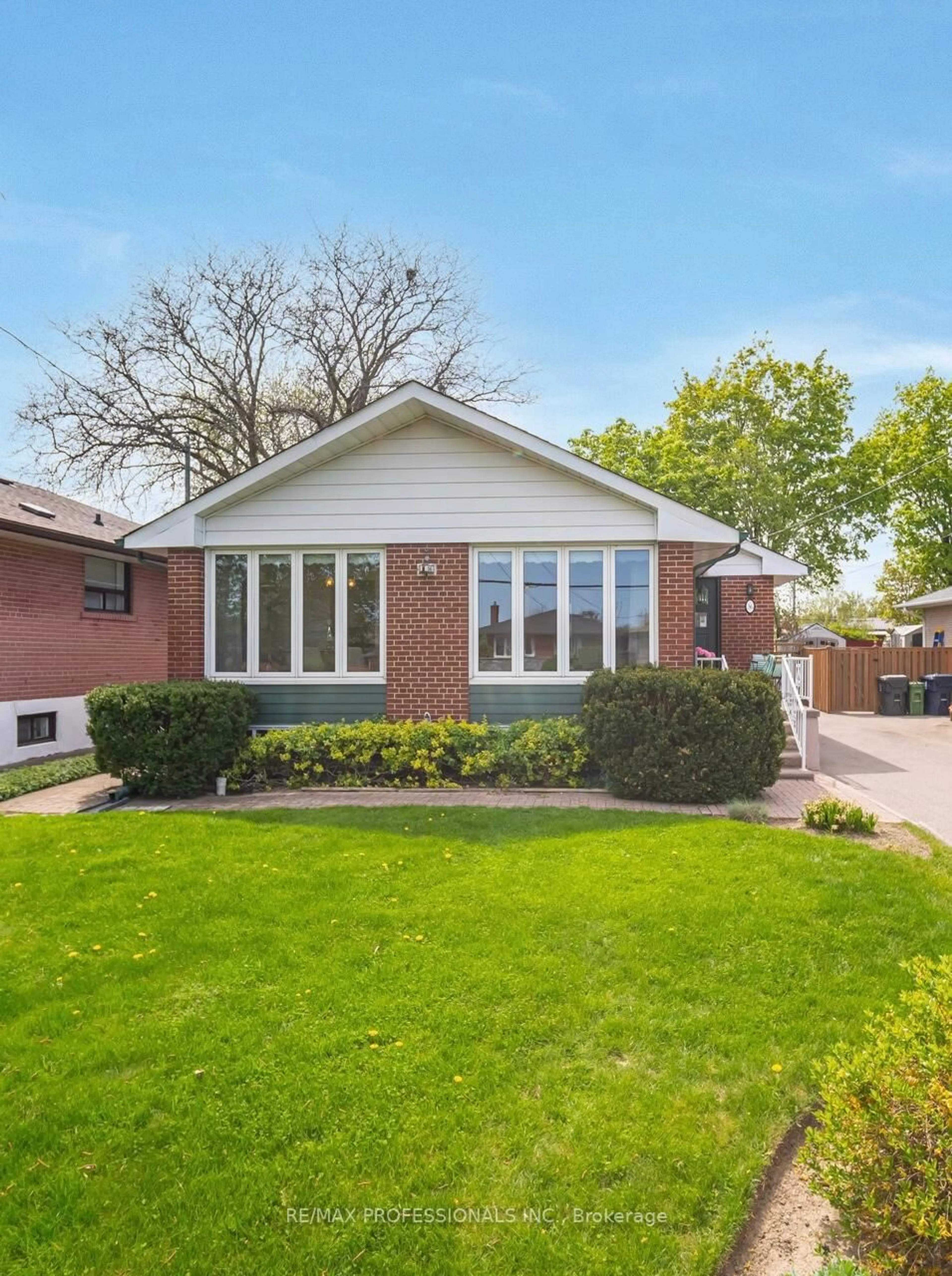Home with brick exterior material, street for 36 Templar Dr, Toronto Ontario M9R 3C7