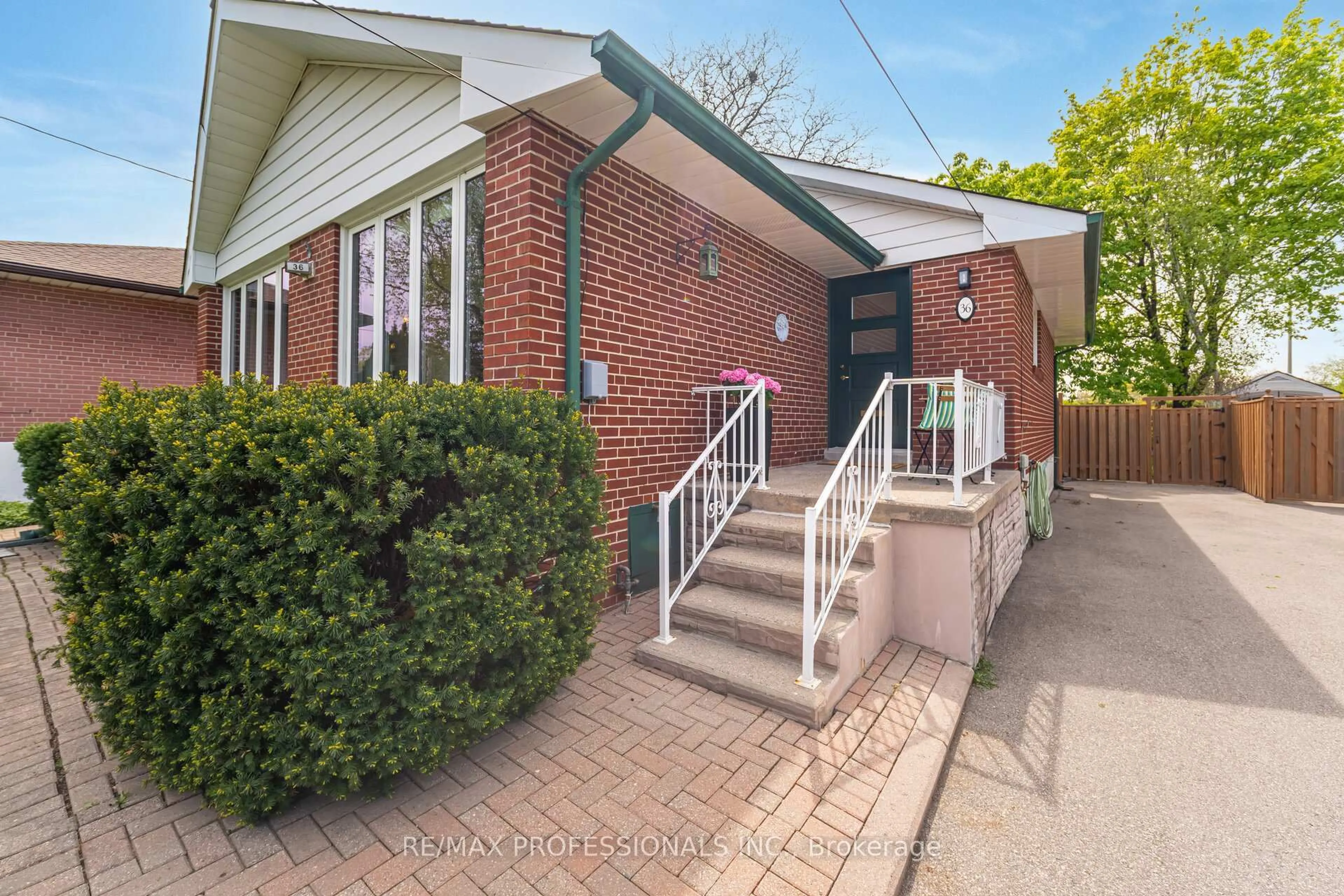 Home with brick exterior material, street for 36 Templar Dr, Toronto Ontario M9R 3C7