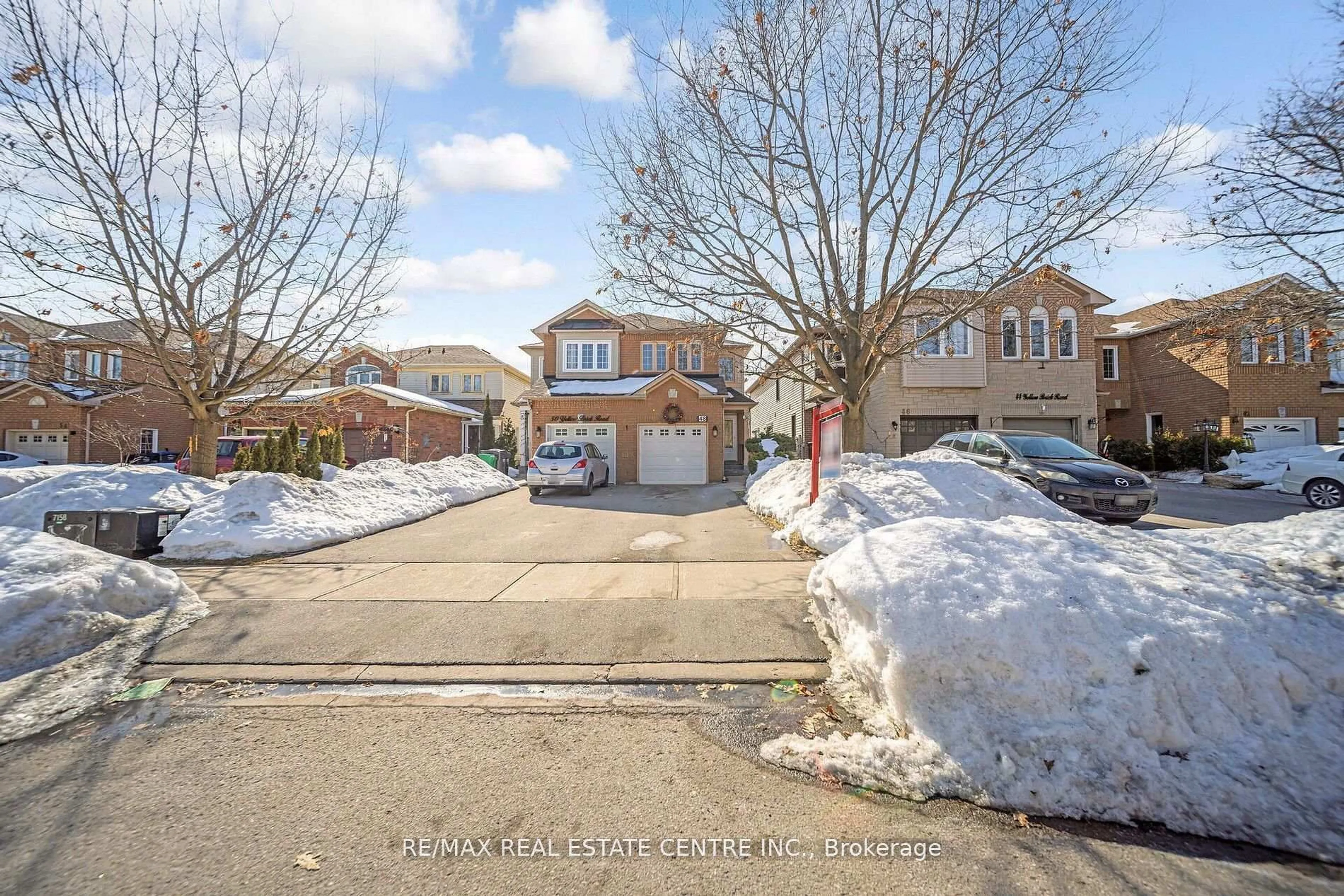 A pic from outside/outdoor area/front of a property/back of a property/a pic from drone, street for 48 Yellow Brick Rd, Brampton Ontario L6V 4L1