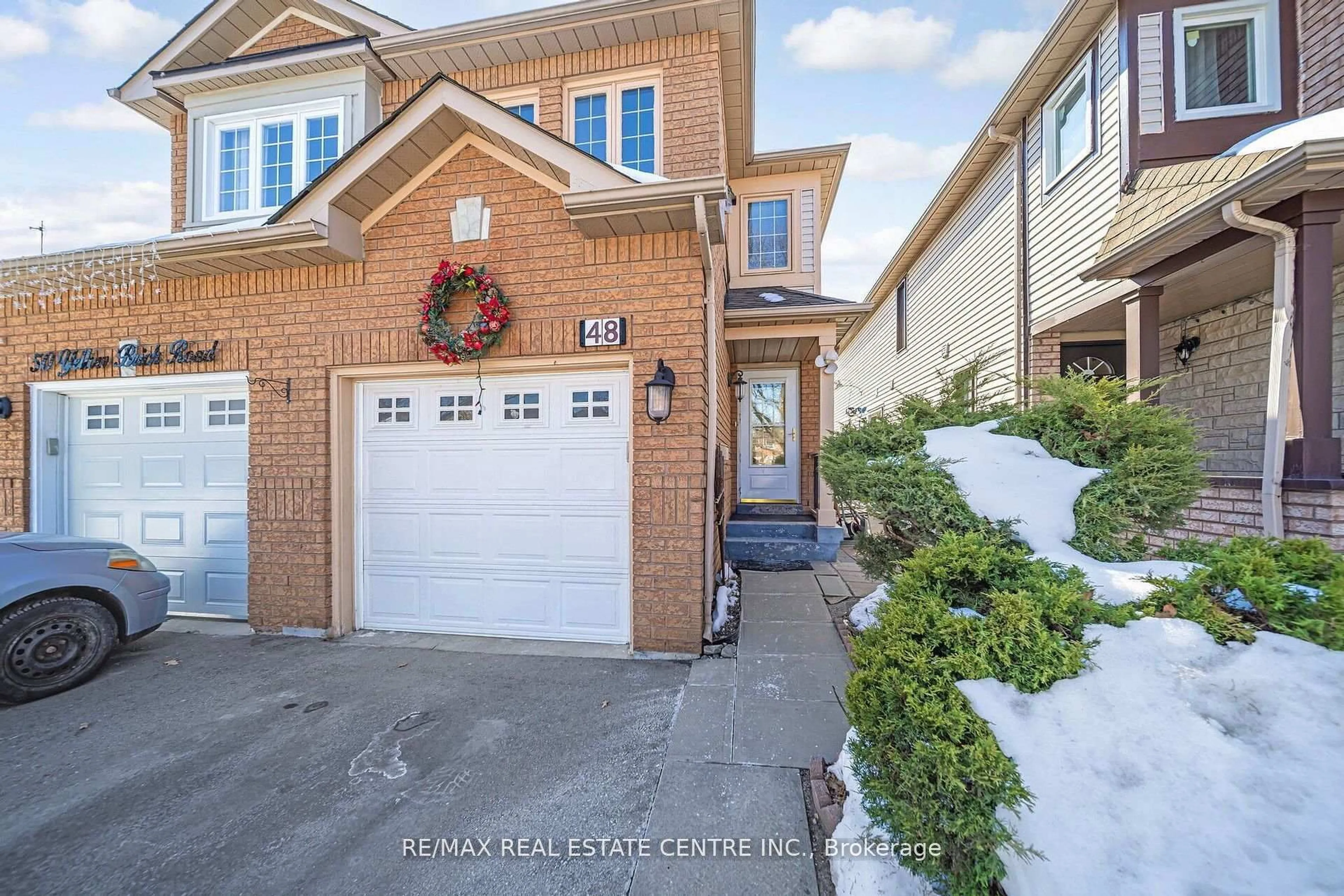 Home with brick exterior material, street for 48 Yellow Brick Rd, Brampton Ontario L6V 4L1