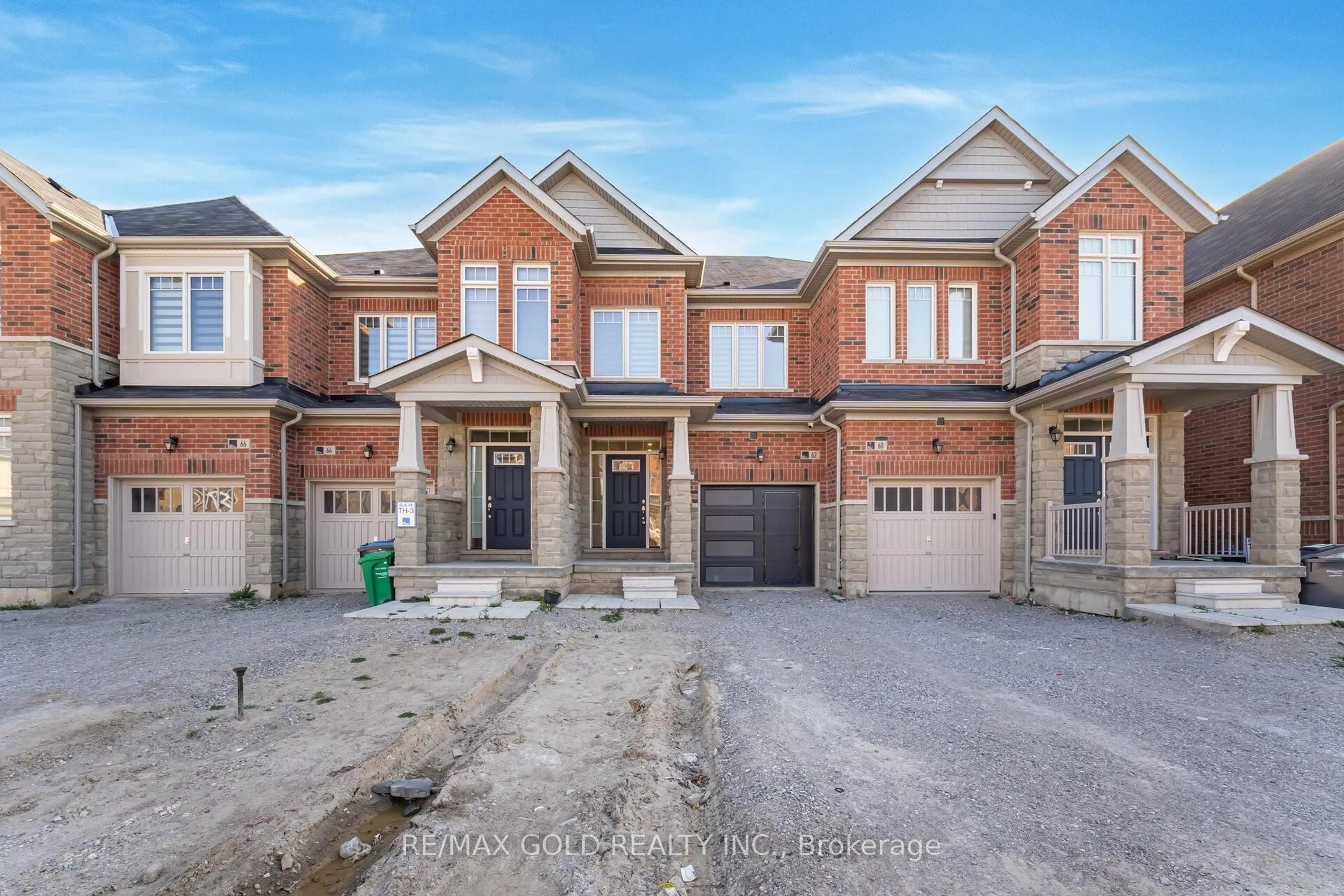 Home with brick exterior material, street for 62 Tundra Rd, Caledon Ontario L7C 4G9