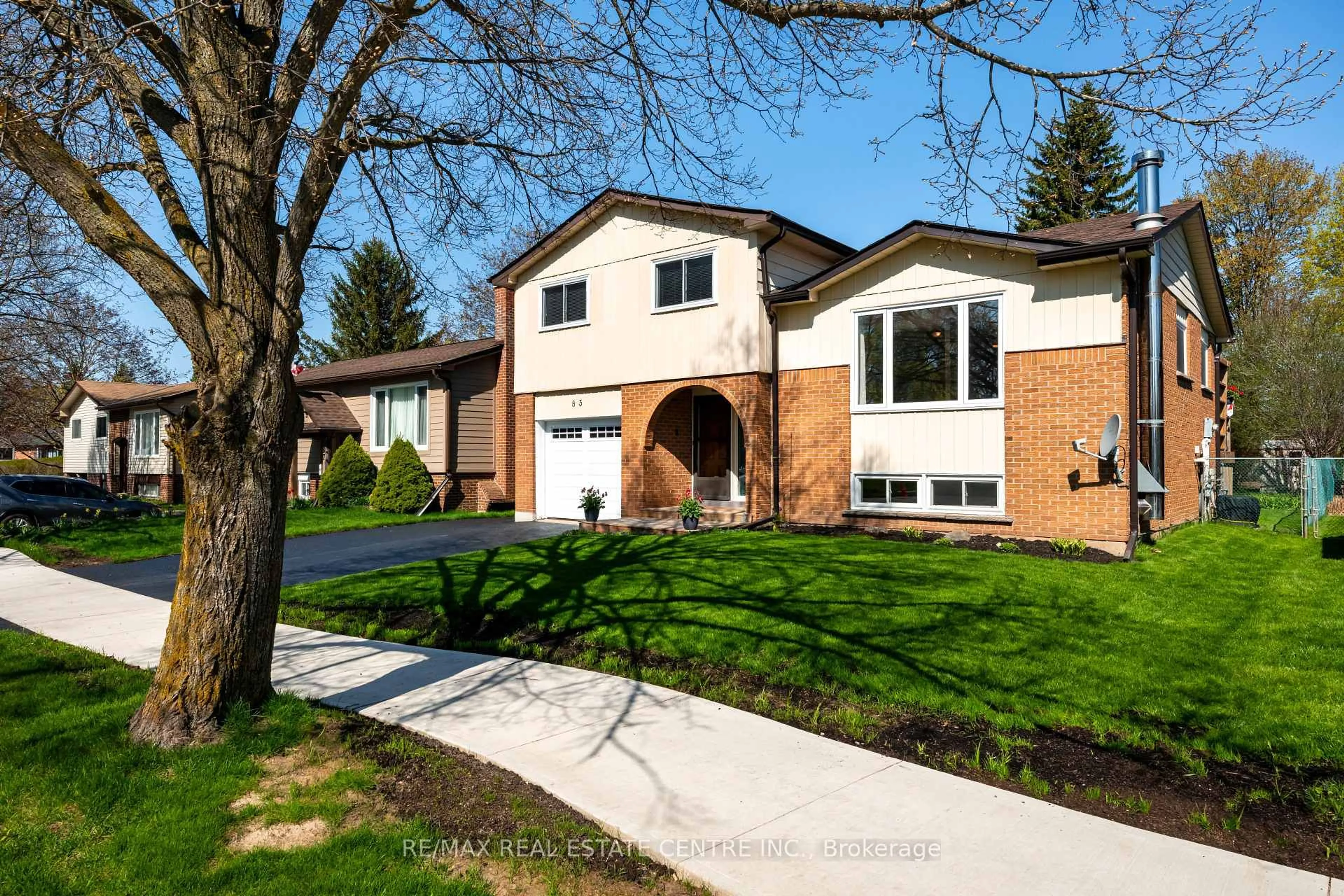 Home with brick exterior material, street for 83 Highland Dr, Orangeville Ontario L9W 3J5