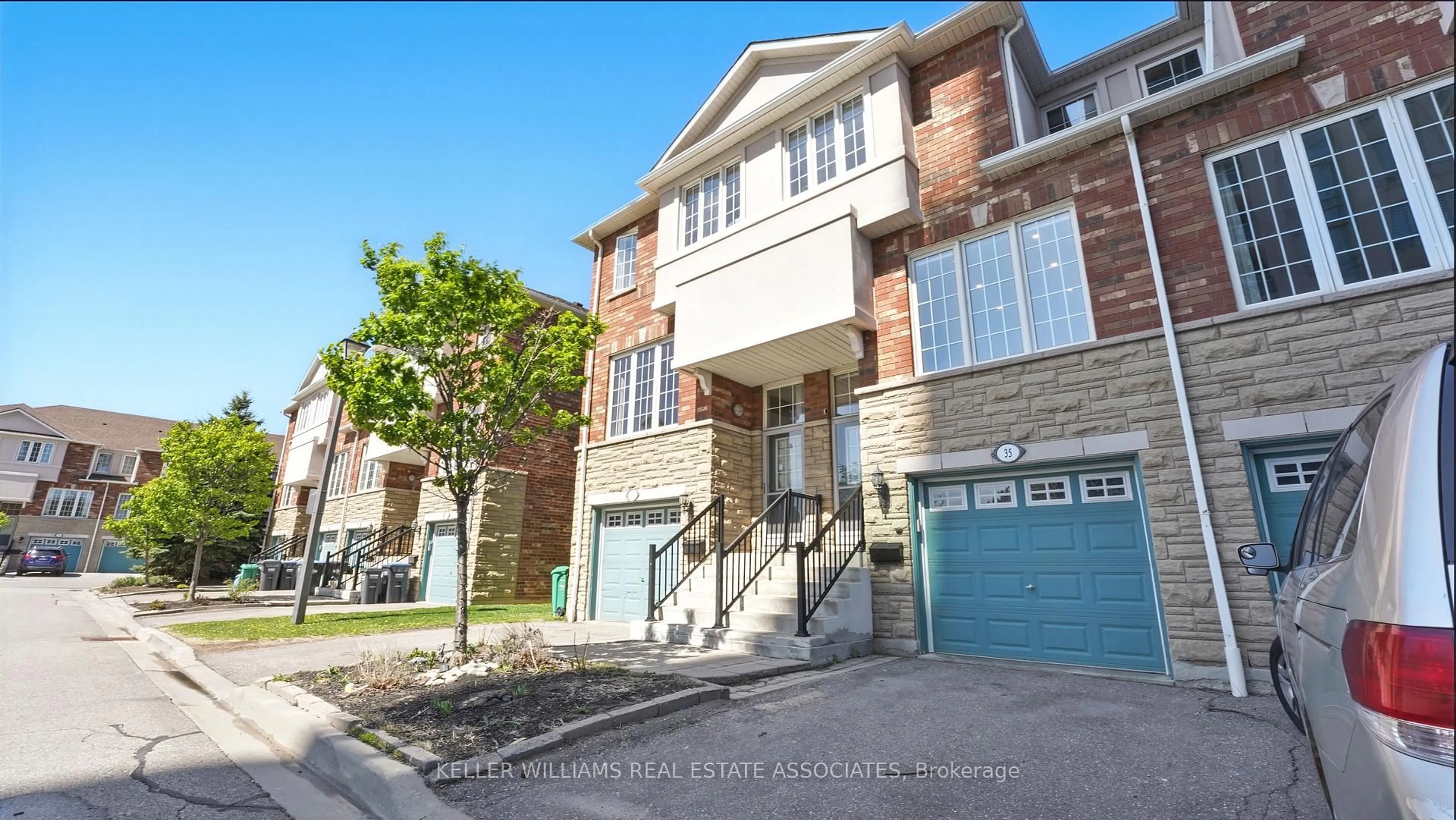 Home with brick exterior material, street for 1355 Rathburn Rd #35, Mississauga Ontario L4W 5R5