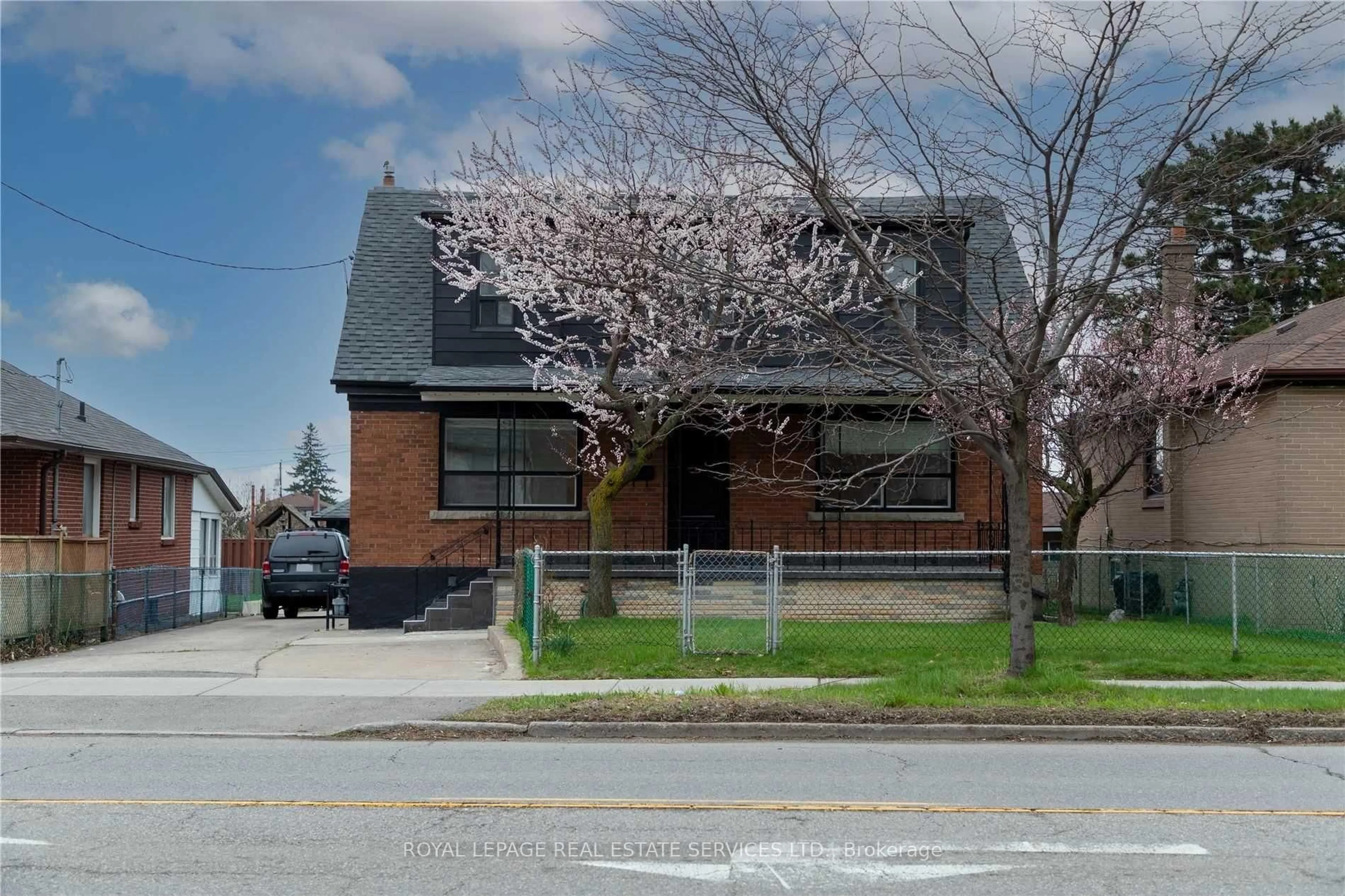 Home with brick exterior material, street for 1010 Caledonia Rd, Toronto Ontario M6B 3Z1