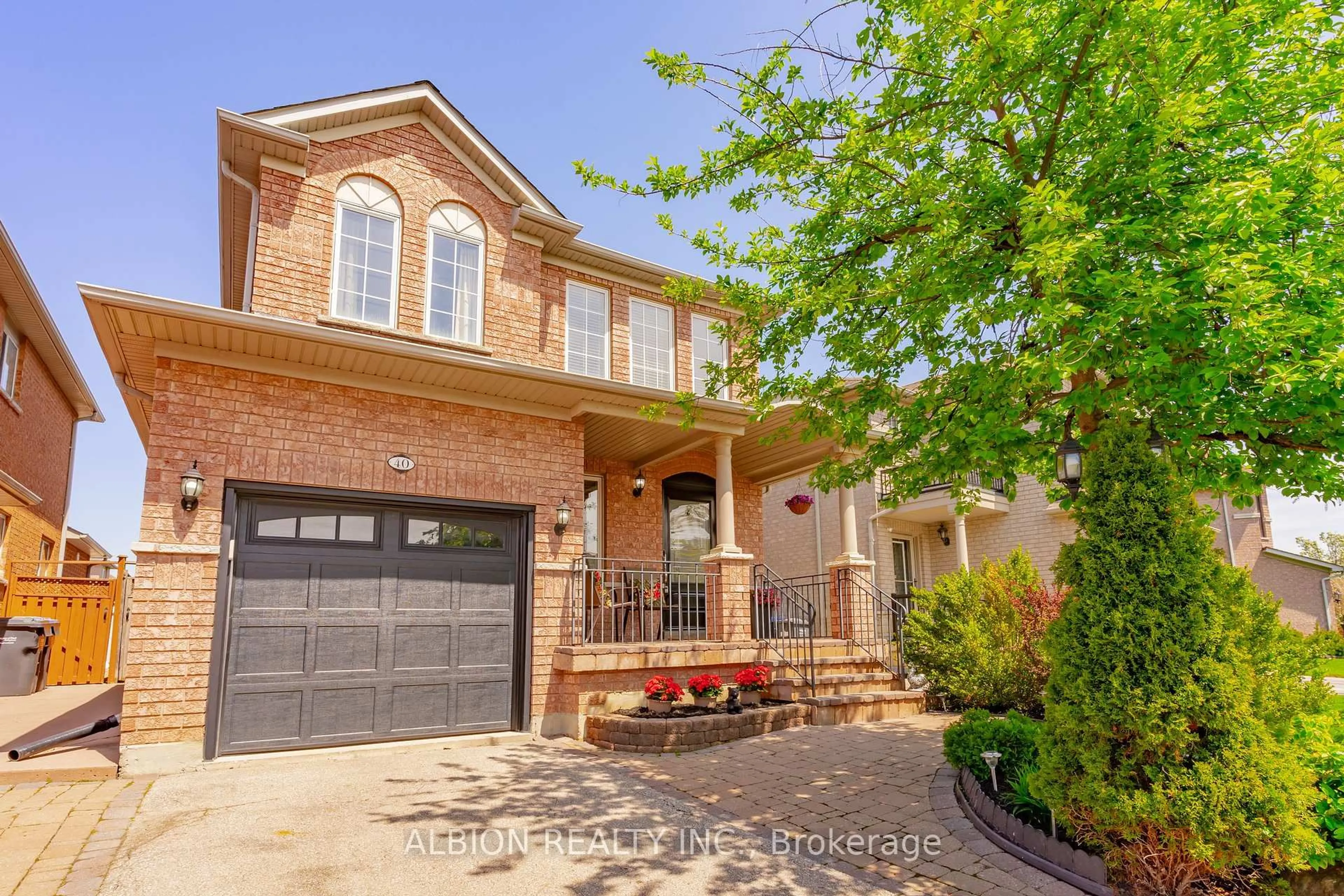 Home with brick exterior material, street for 40 Emily Carr Cres, Caledon Ontario L7E 2K9