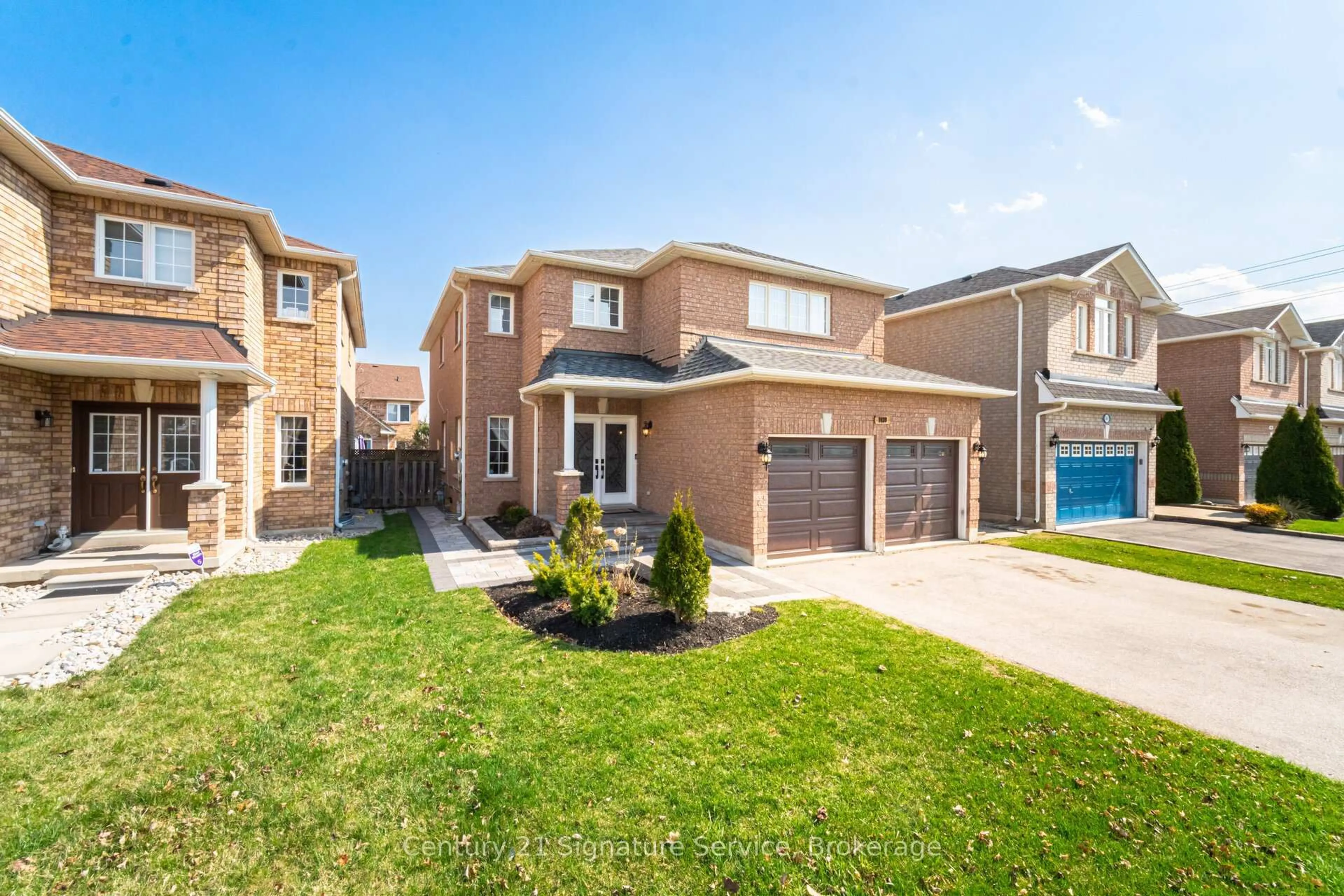 Home with brick exterior material, street for 7439 Allspice Tr, Mississauga Ontario L5N 8N5