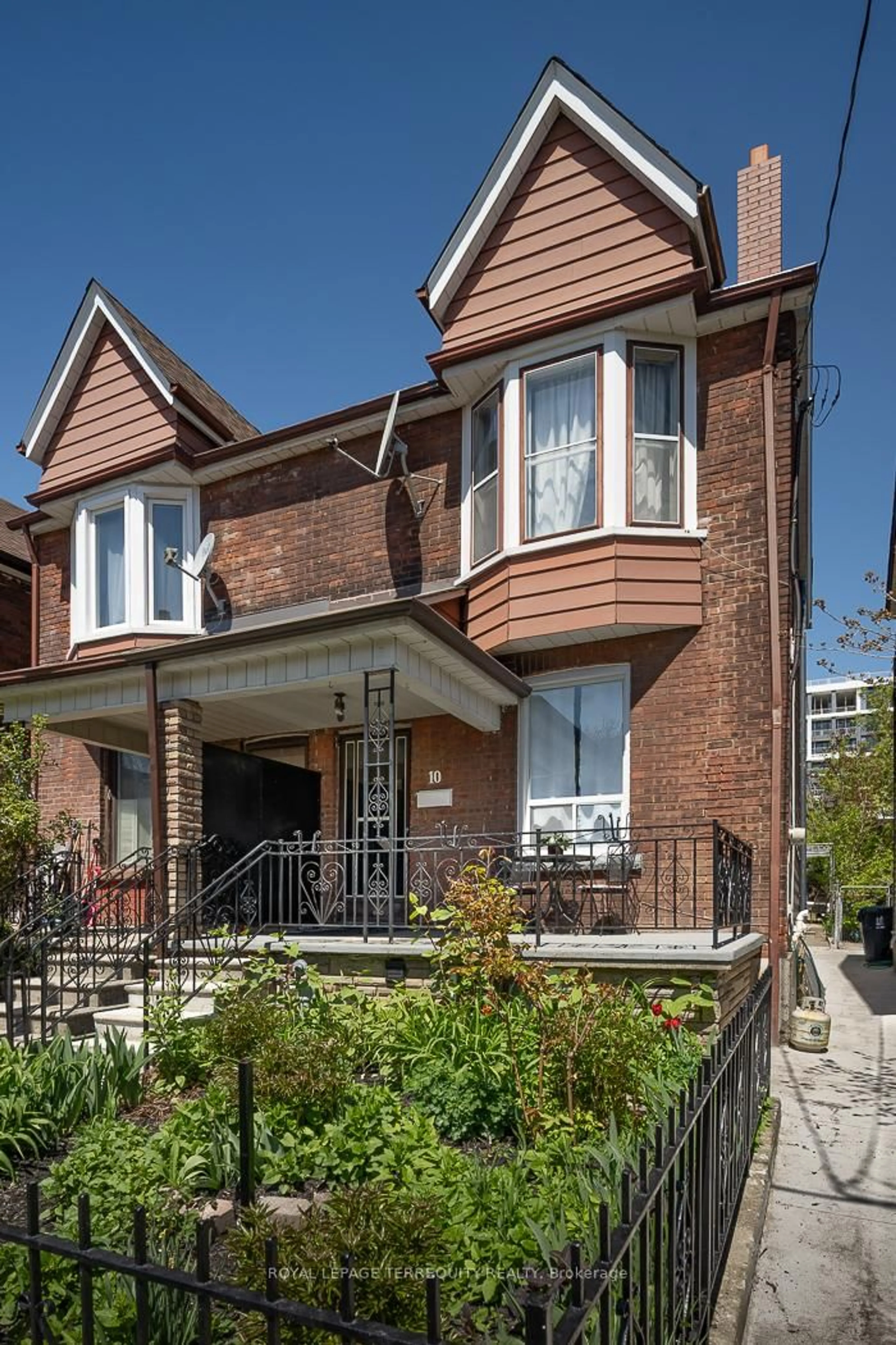 Home with brick exterior material, street for 10 Burnfield Ave, Toronto Ontario M6G 1Y5