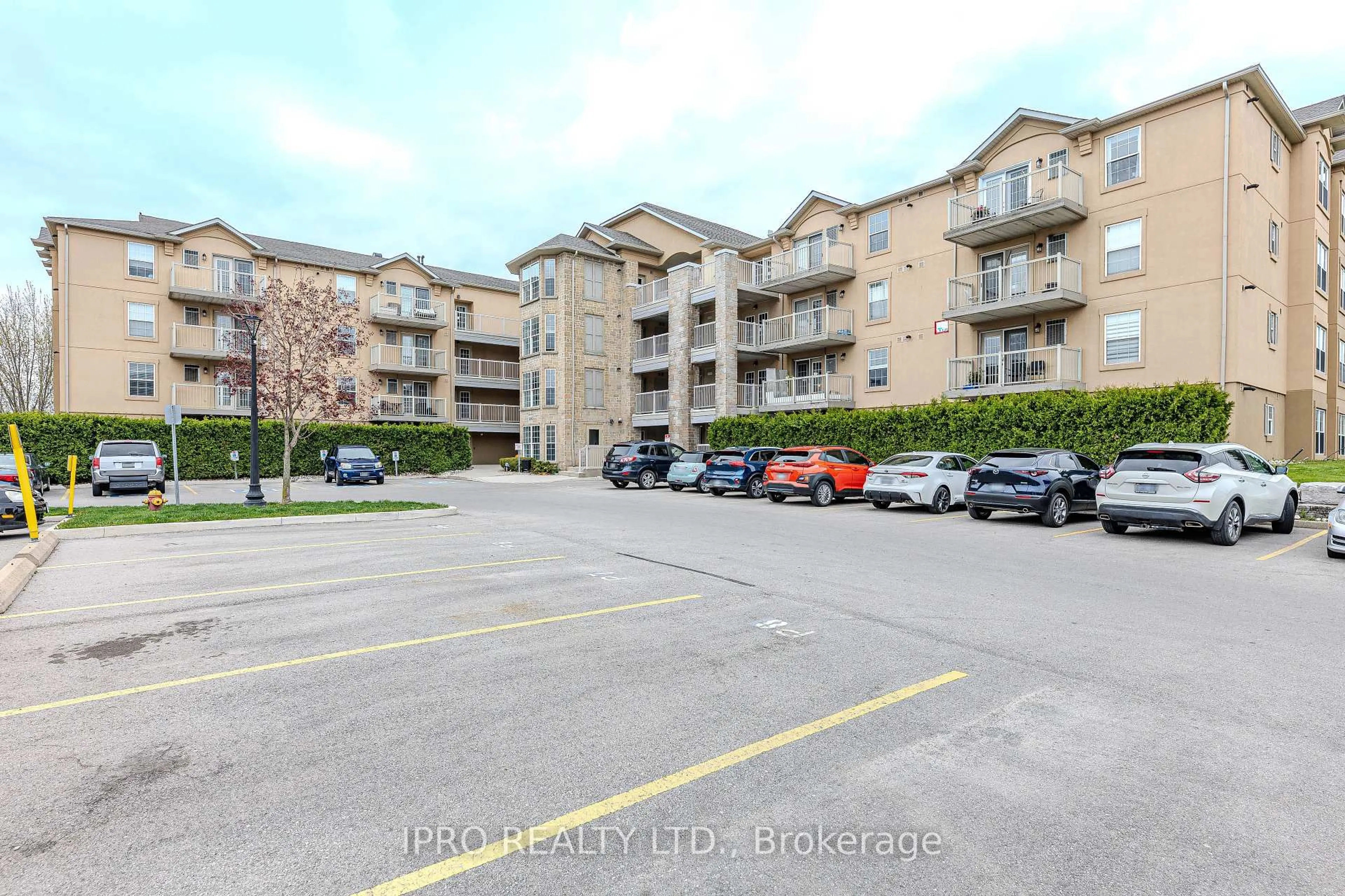 A pic from outside/outdoor area/front of a property/back of a property/a pic from drone, street for 1490 Bishops Gate #106, Oakville Ontario L6M 4N3